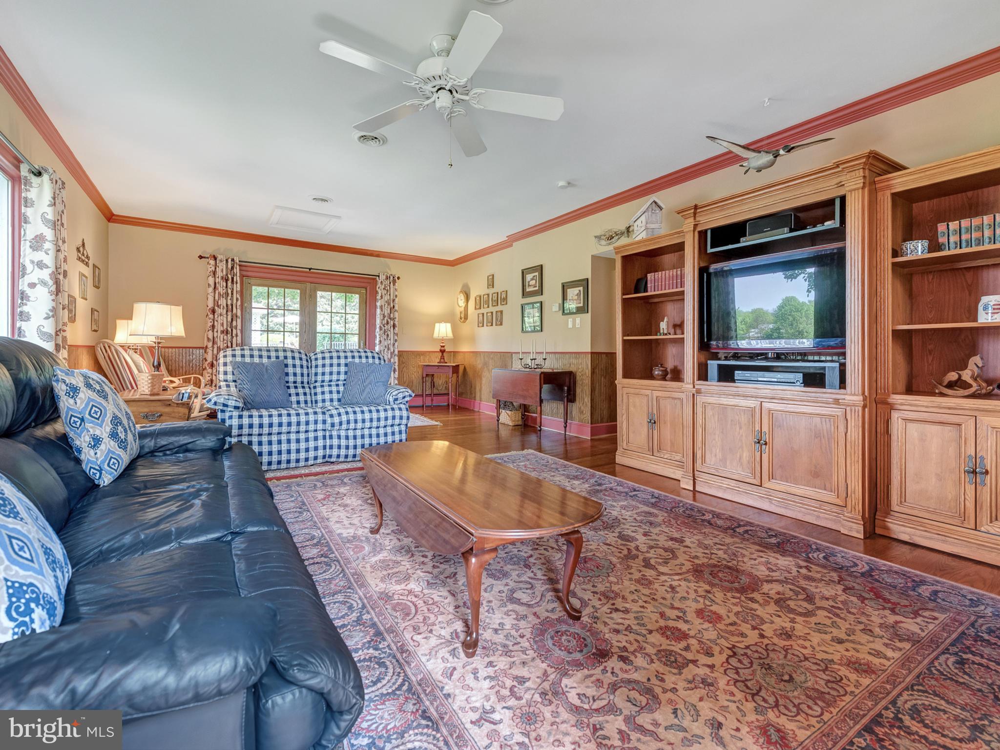 8707 Mapleville Road Boonsboro, MD 21713 - Photo 14 of 30 Expansive Family Room with views of the pond.