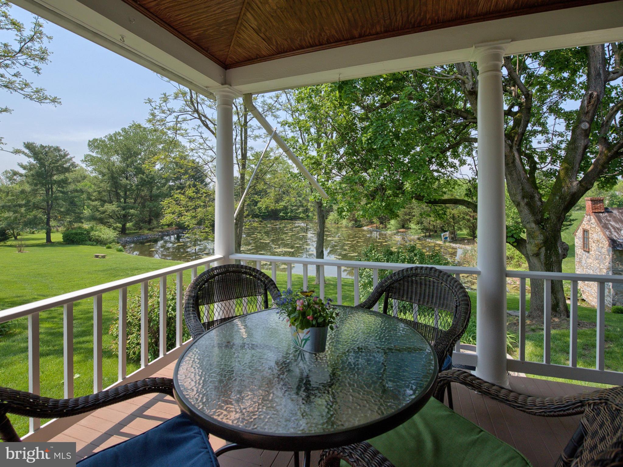 8707 Mapleville Road Boonsboro, MD 21713 - Photo 23 of 30 Relax and enjoy a book on this shaded porch.