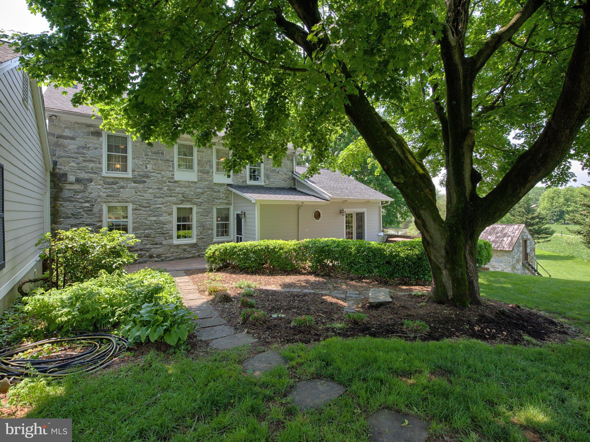 8707 Mapleville Road Boonsboro, MD 21713 - Photo 25 of 30 Flower beds and majestic trees surround you.