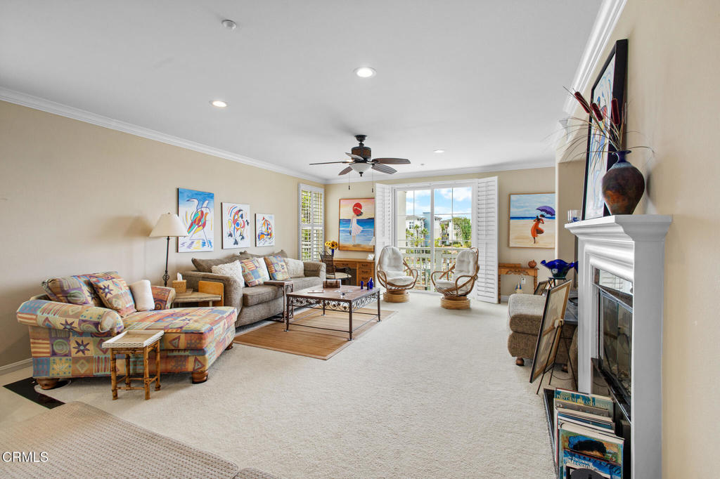 1547 Windshore Way Oxnard, CA 93035 - Photo 12 of 33 a living room with furniture and a flat screen tv