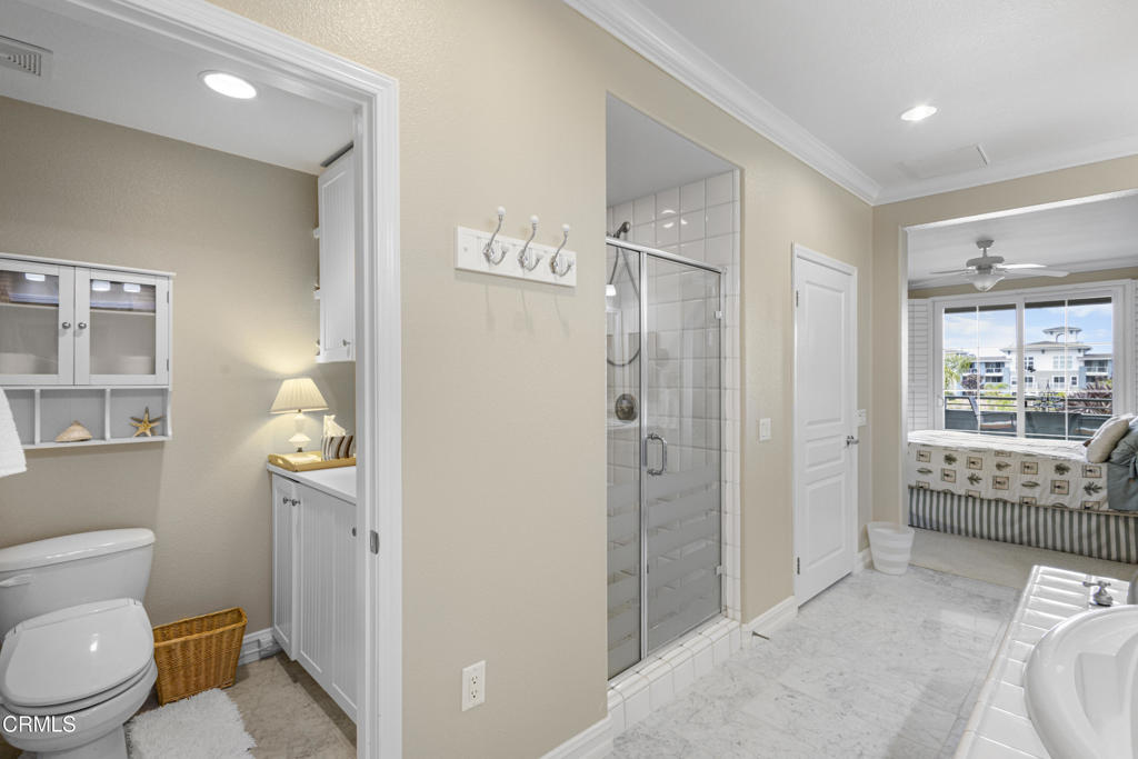 1547 Windshore Way Oxnard, CA 93035 - Photo 21 of 33 a bathroom with a shower a toilet and a sink