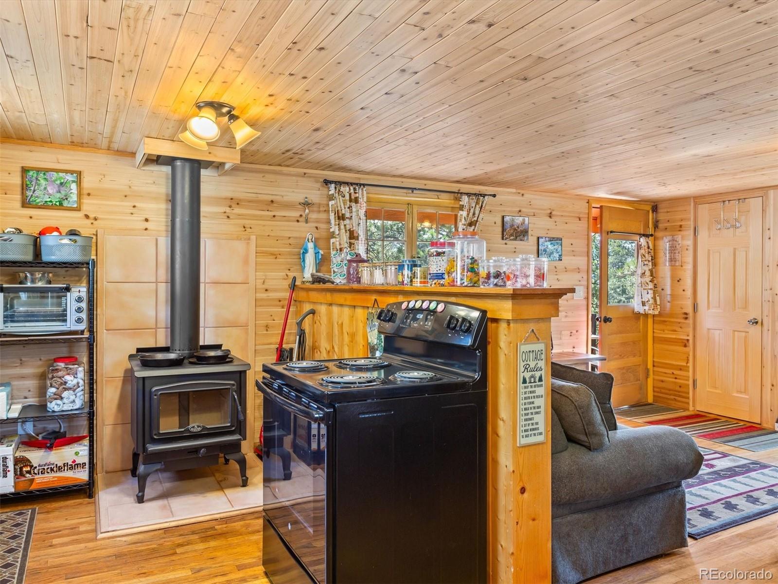 P69 P 69 Bailey, CO 80421 - Photo 12 of 22 a view of a living room with furniture and a fireplace