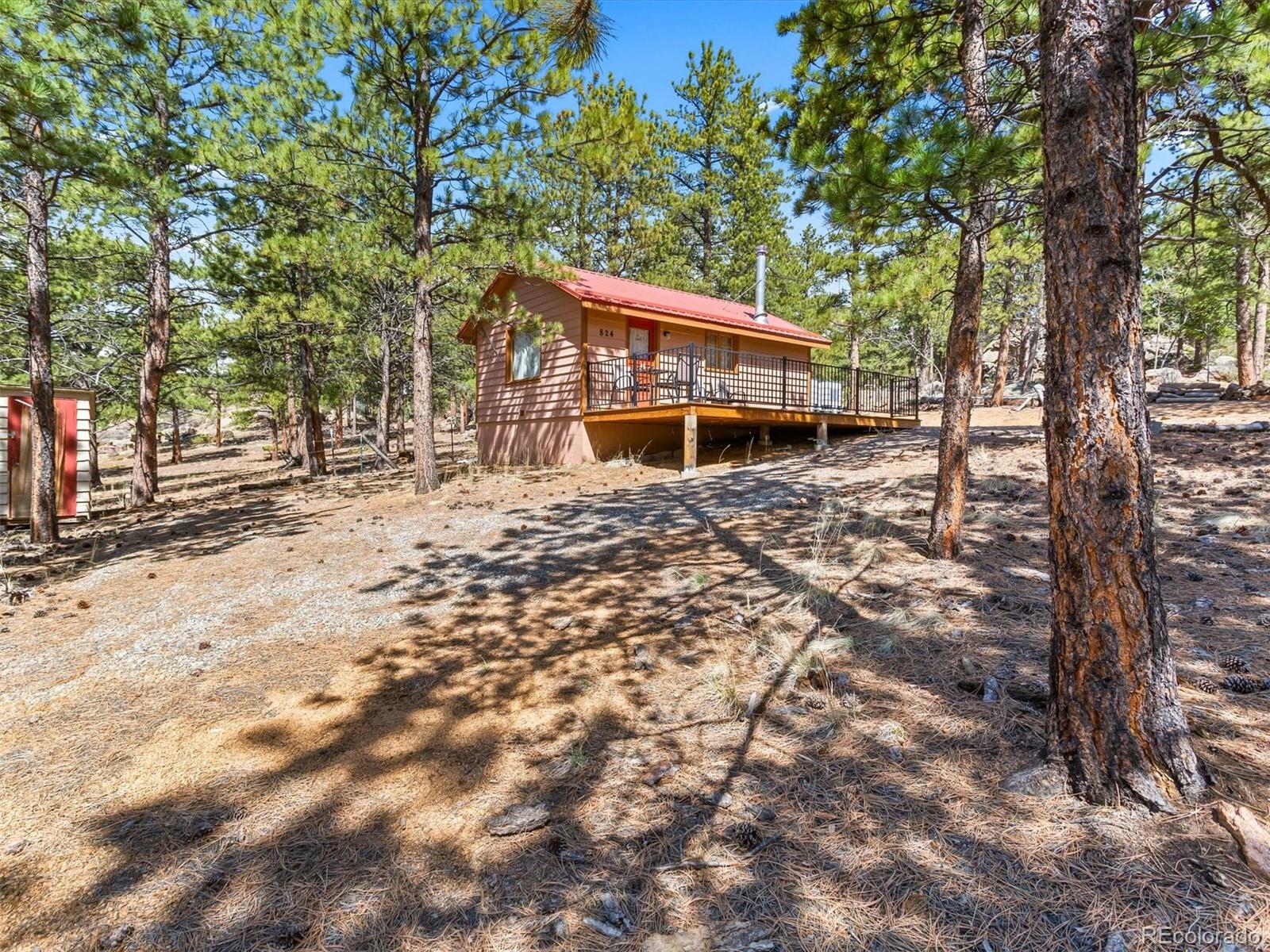 P69 P 69 Bailey, CO 80421 - Photo 16 of 22 a view of house with yard