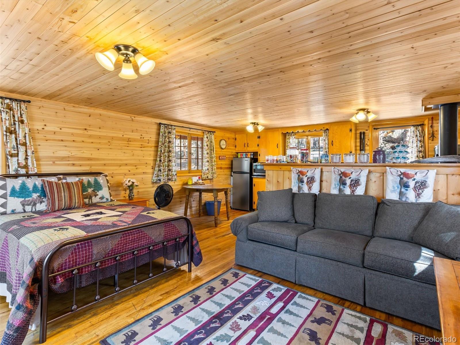 P69 P 69 Bailey, CO 80421 - Photo 6 of 22 a bed room with bed and balcony