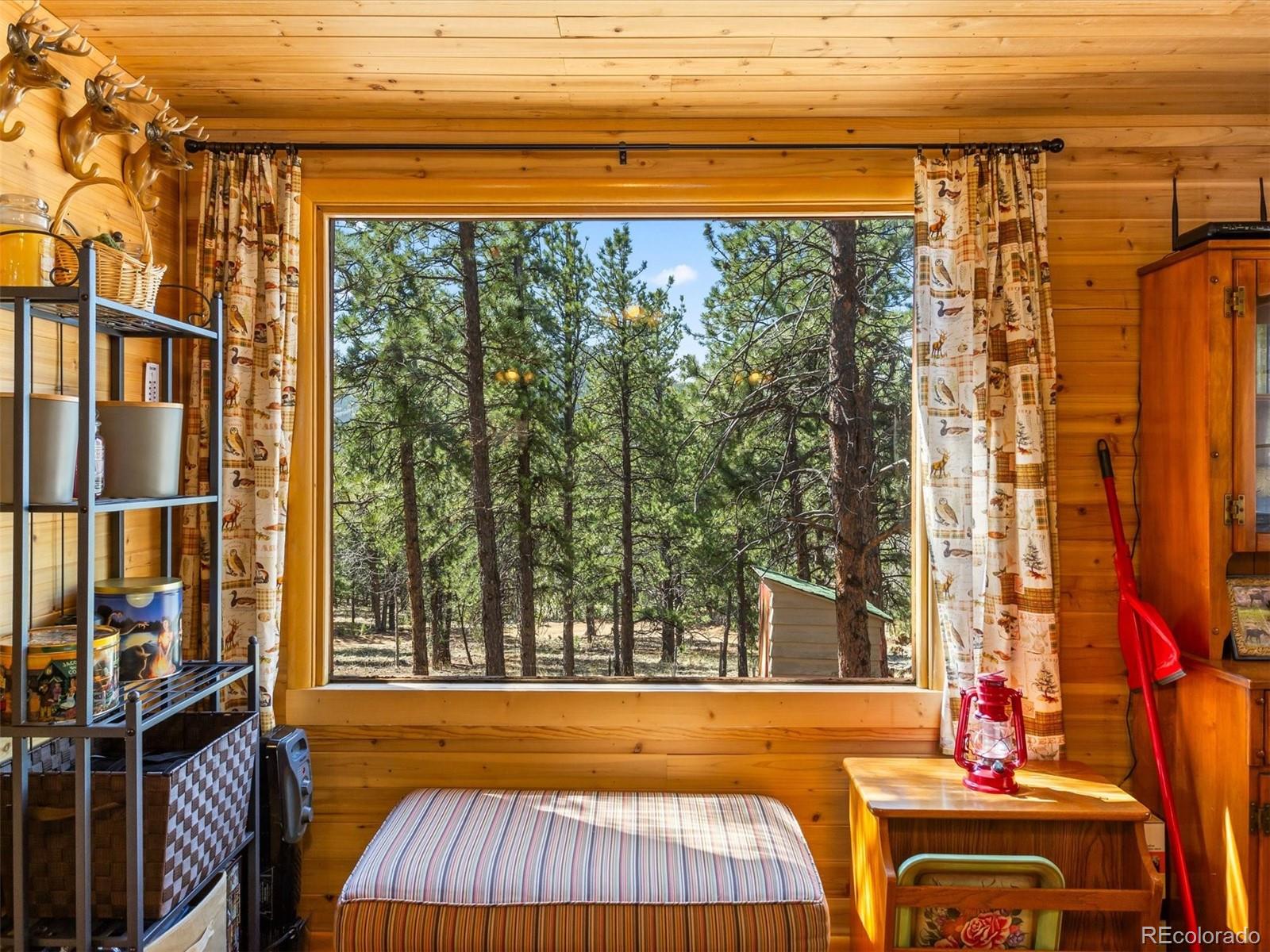 P69 P 69 Bailey, CO 80421 - Photo 10 of 22 a view of a balcony with furniture and city view
