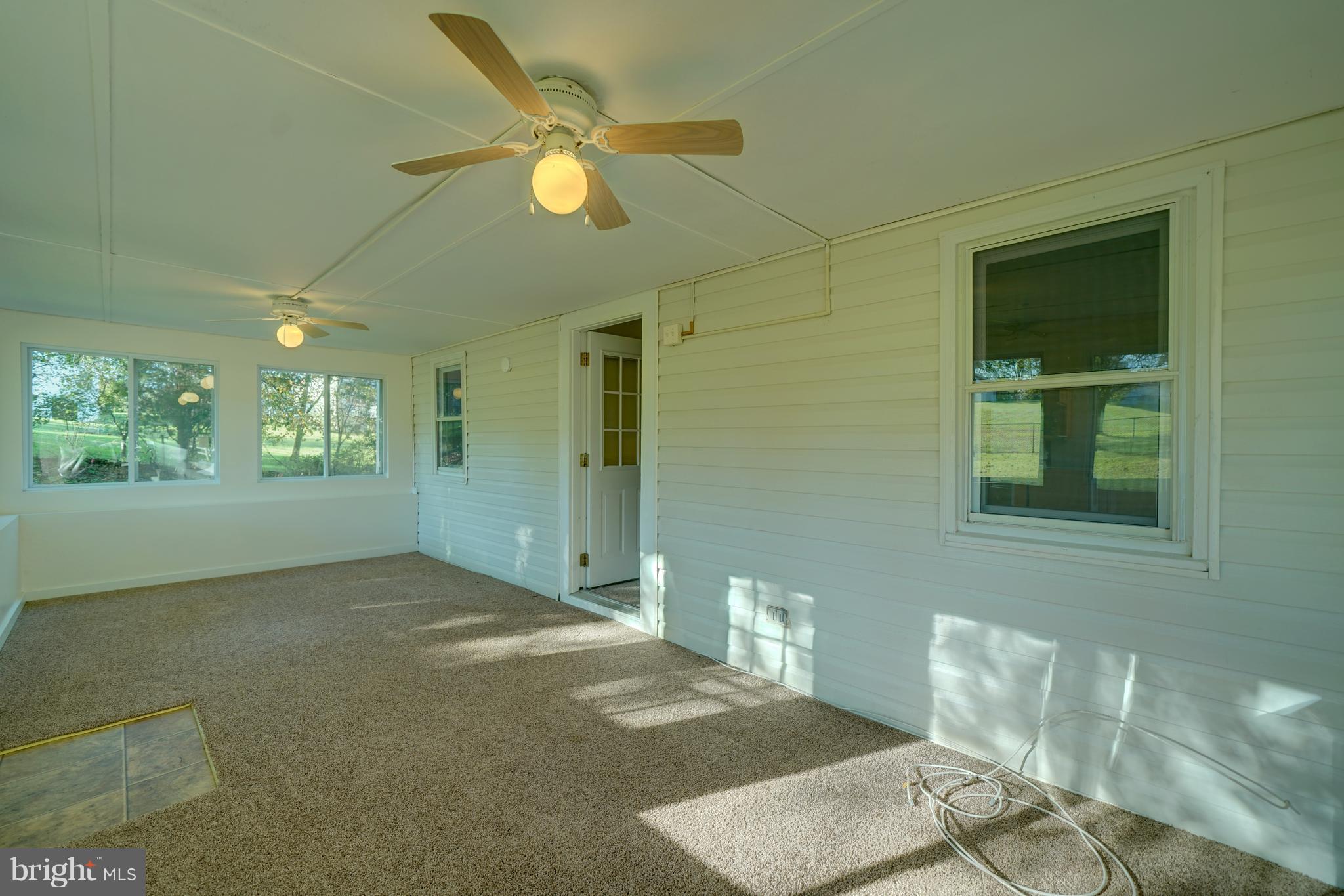 10682 Scaggsville Road Laurel, MD 20723 - Photo 11 of 49 Thermal windows and ceiling fans