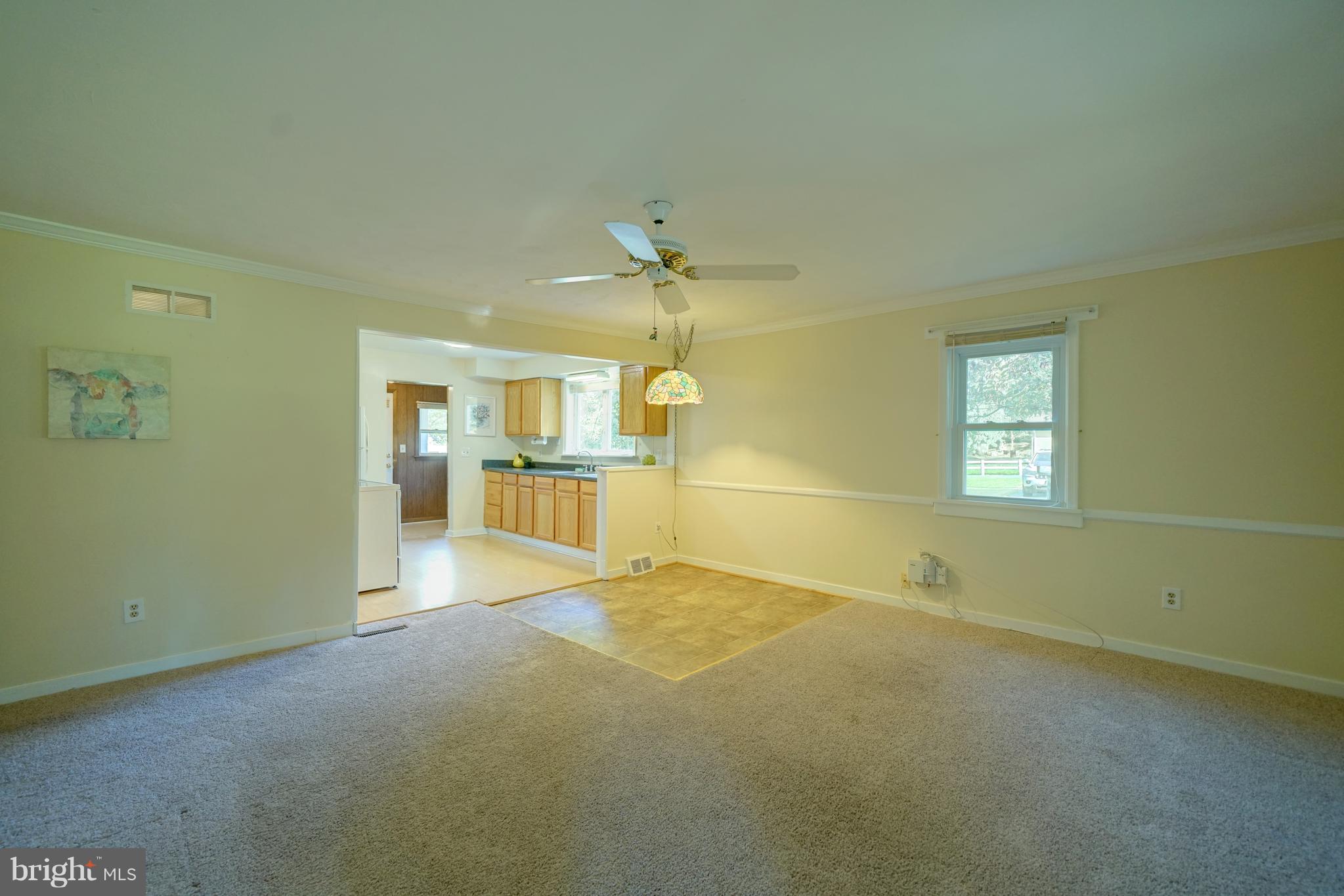 10682 Scaggsville Road Laurel, MD 20723 - Photo 14 of 49 Table space between kitchen/great room