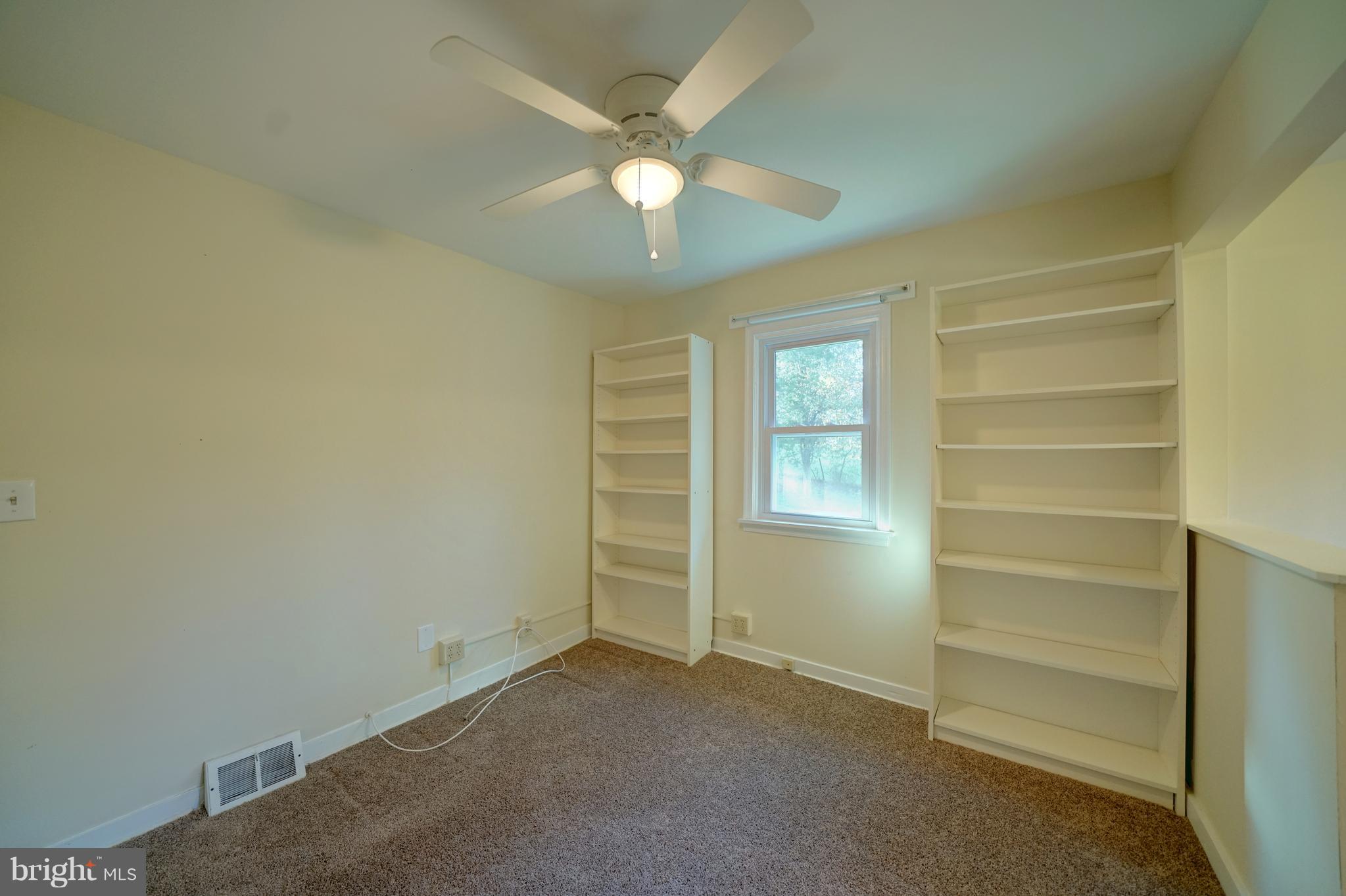 10682 Scaggsville Road Laurel, MD 20723 - Photo 35 of 49 Built in shelving in bedroom