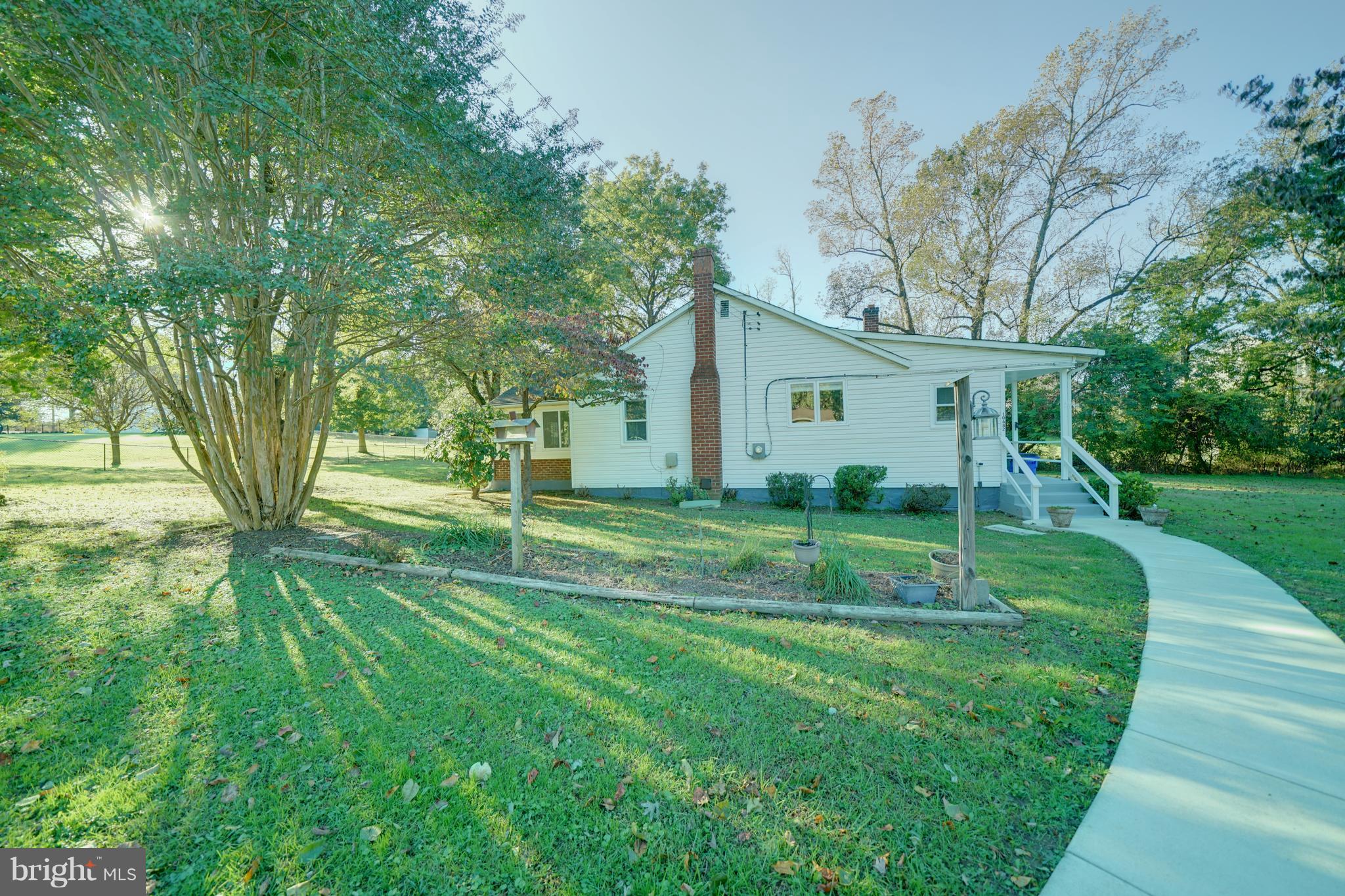 10682 Scaggsville Road Laurel, MD 20723 - Photo 48 of 49 Sidewalk to the back porch entrance
