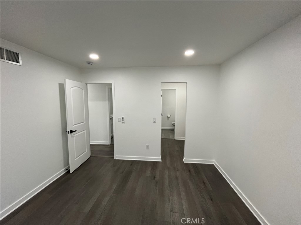 9155 Pacific Avenue, Unit 219 Anaheim, CA 92804 - Photo 19 of 26 wooden floor in an empty room