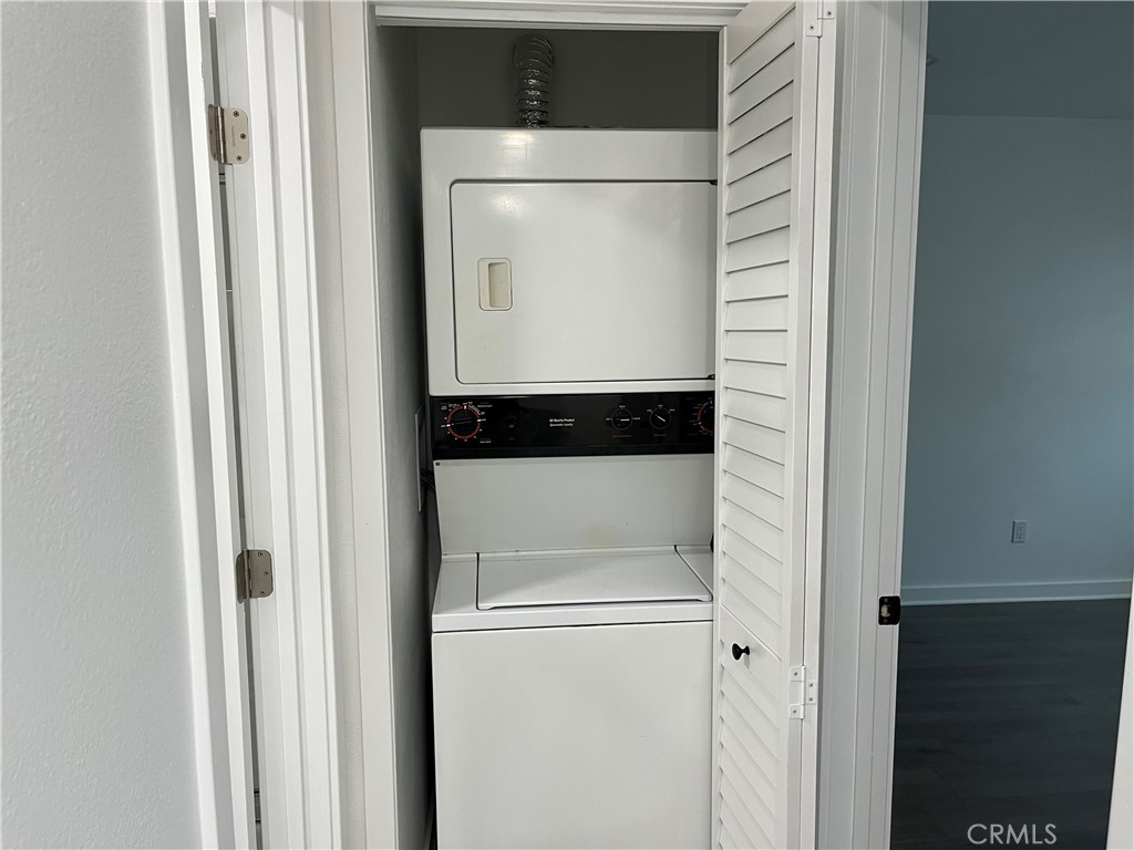 9155 Pacific Avenue, Unit 219 Anaheim, CA 92804 - Photo 24 of 26 a utility room with washer and dryer