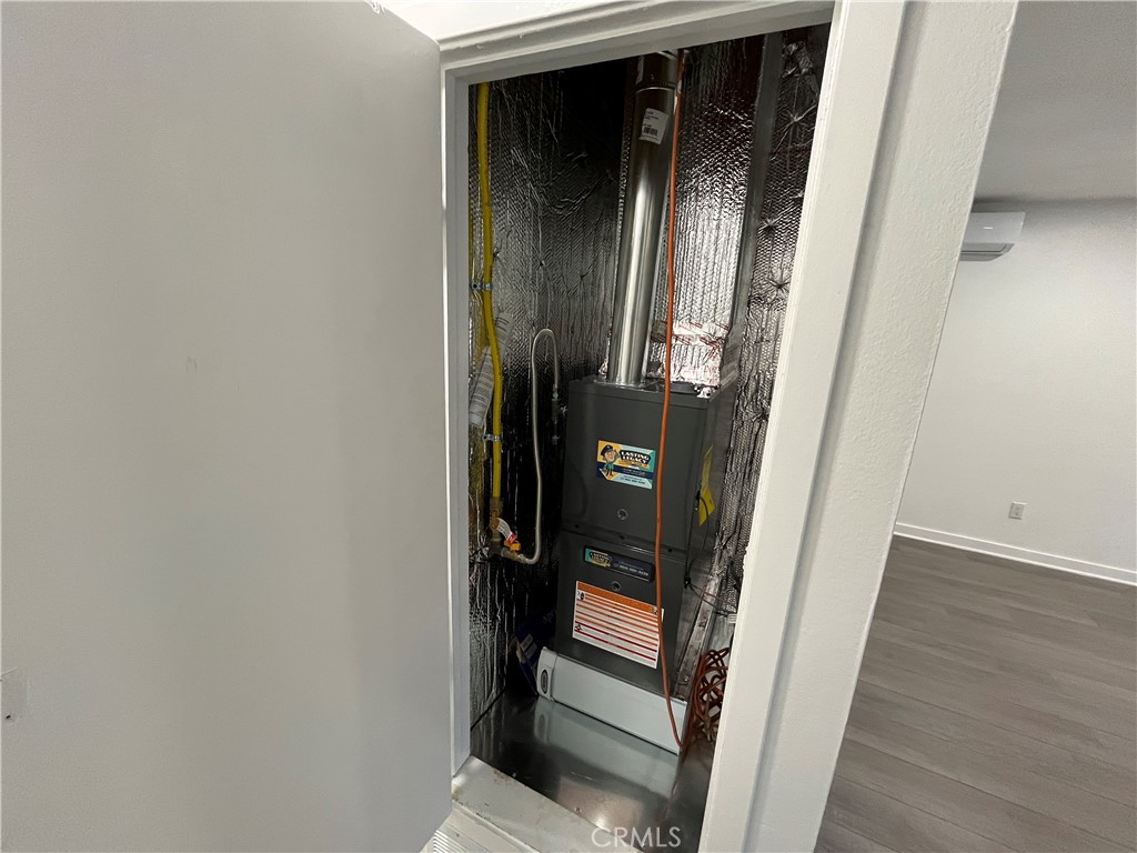 9155 Pacific Avenue, Unit 219 Anaheim, CA 92804 - Photo 25 of 26 a view of a hallway