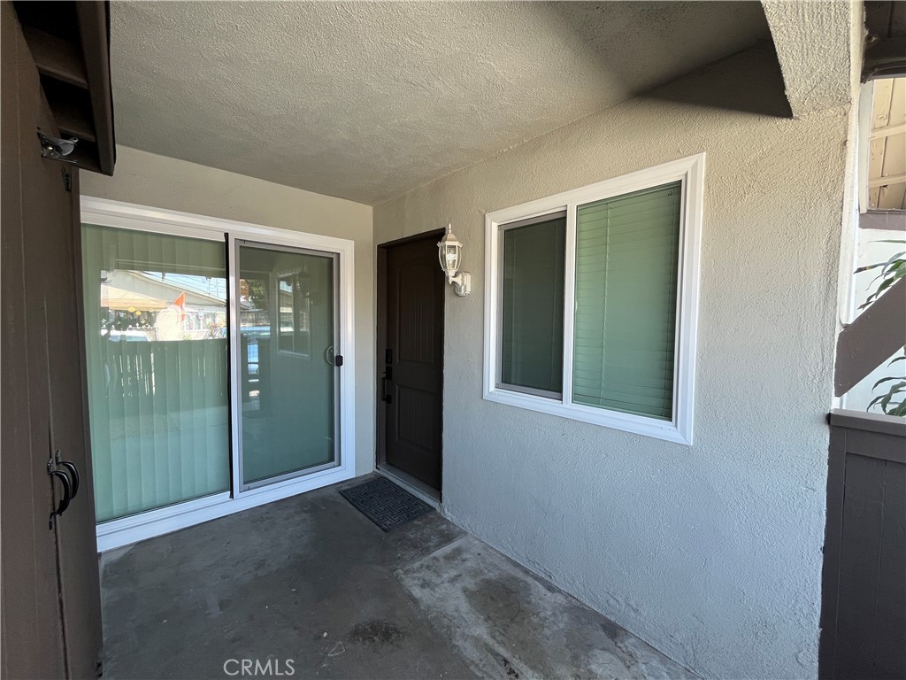 9155 Pacific Avenue, Unit 219 Anaheim, CA 92804 - Photo 3 of 26 wooden floor and window in a room