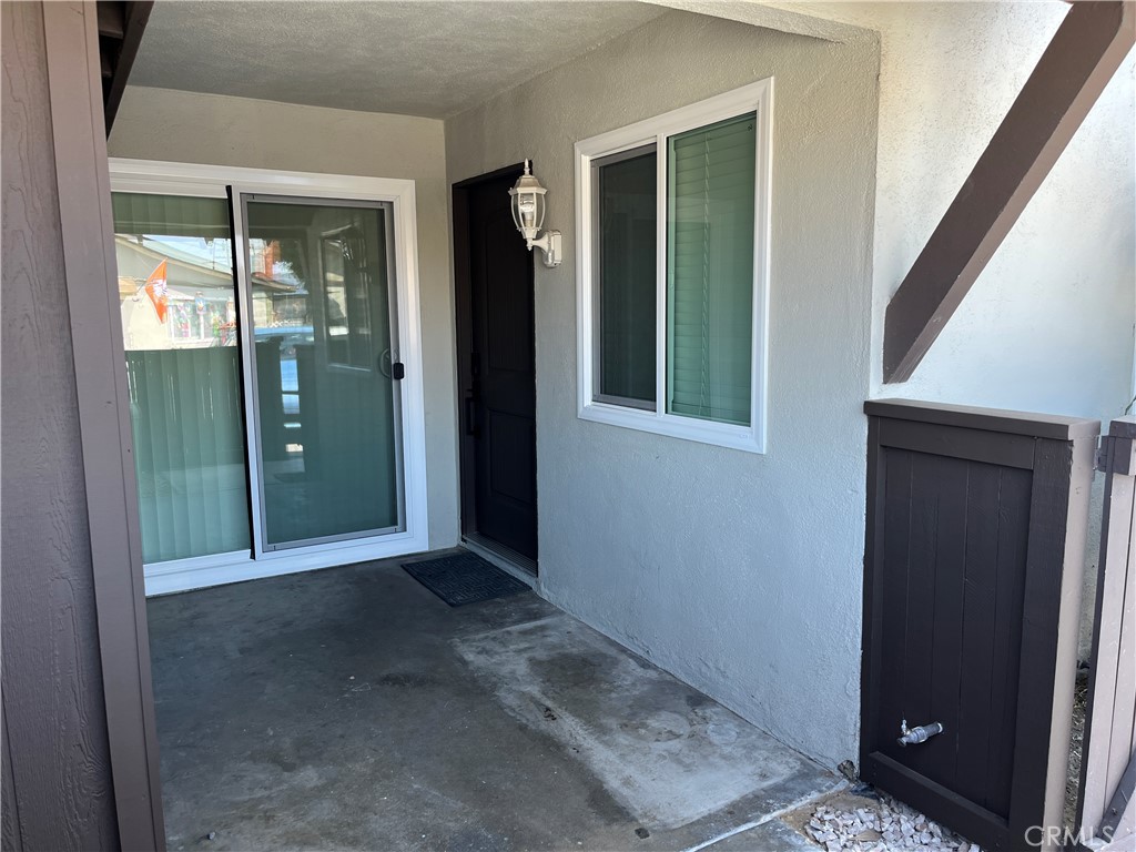 9155 Pacific Avenue, Unit 219 Anaheim, CA 92804 - Photo 5 of 26 an empty room with windows and closet