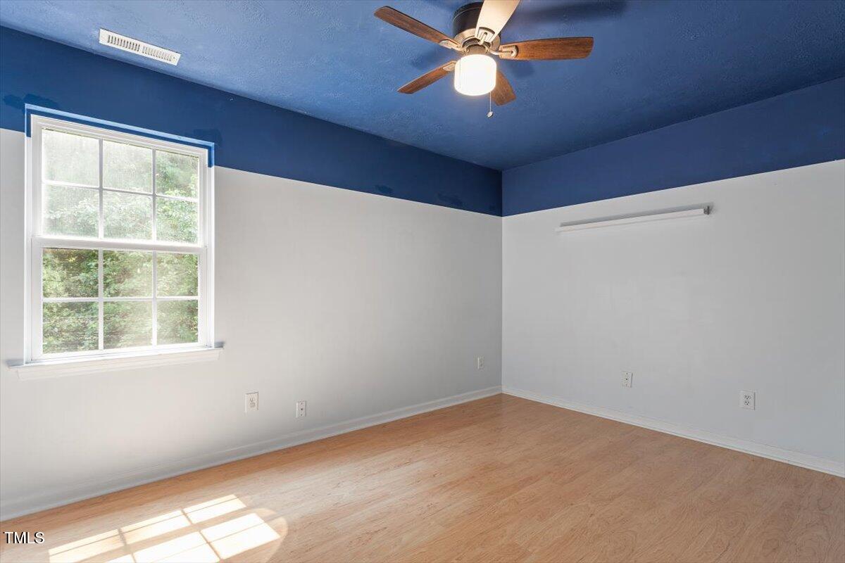 2733 Midway Park Court Raleigh, NC 27610 - Photo 17 of 30 a view of an empty room with a window