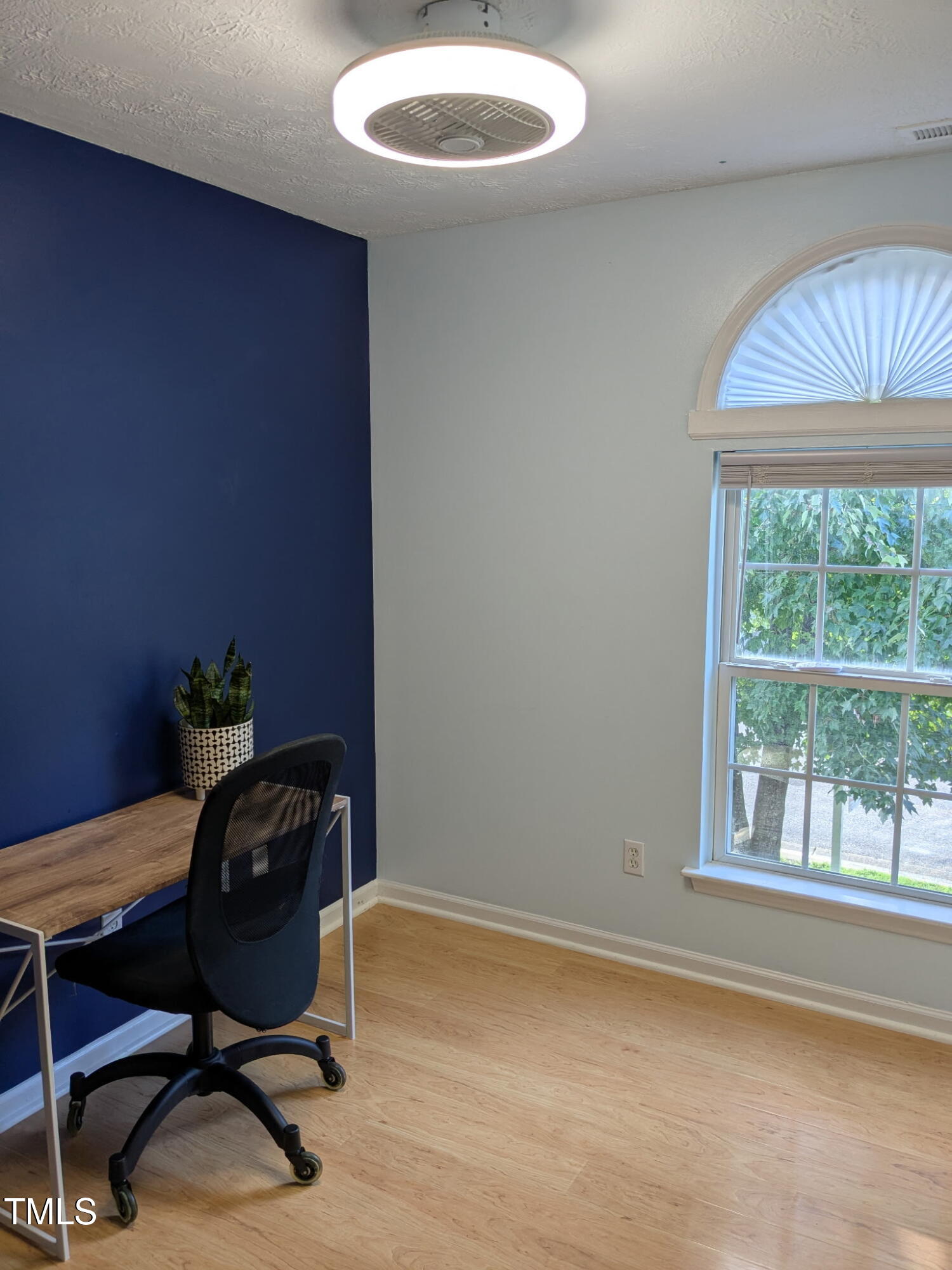 2733 Midway Park Court Raleigh, NC 27610 - Photo 20 of 30 a workspace with furniture and a window