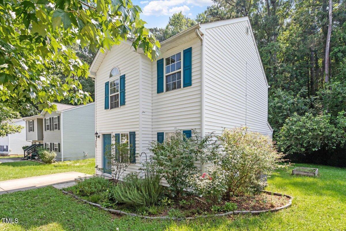 2733 Midway Park Court Raleigh, NC 27610 - Photo 3 of 30 a view of a house with backyard and sitting area