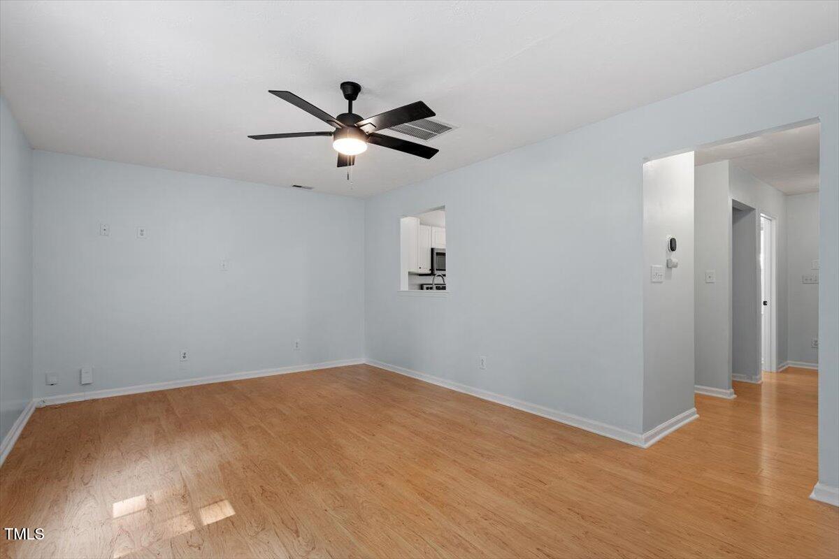2733 Midway Park Court Raleigh, NC 27610 - Photo 7 of 30 a view of an empty room