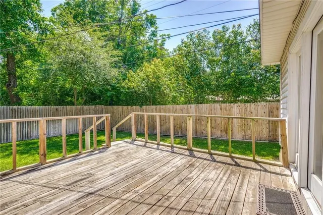 a view of a backyard with a small garden
