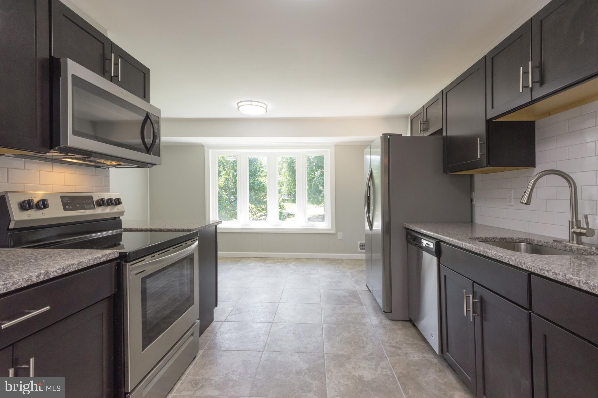 2712 Rambler Place Adelphi, MD 20783 - Photo 9 of 30 Kitchen with Grainte Counters