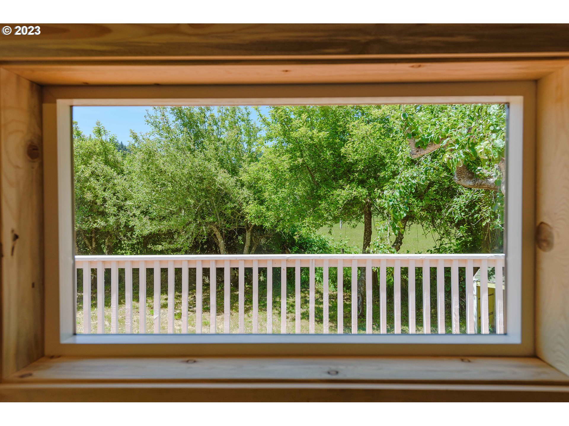 54156 Old Broadbent Road Myrtle Point, OR 97458 - Photo 12 of 48 a view of a wooden balcony