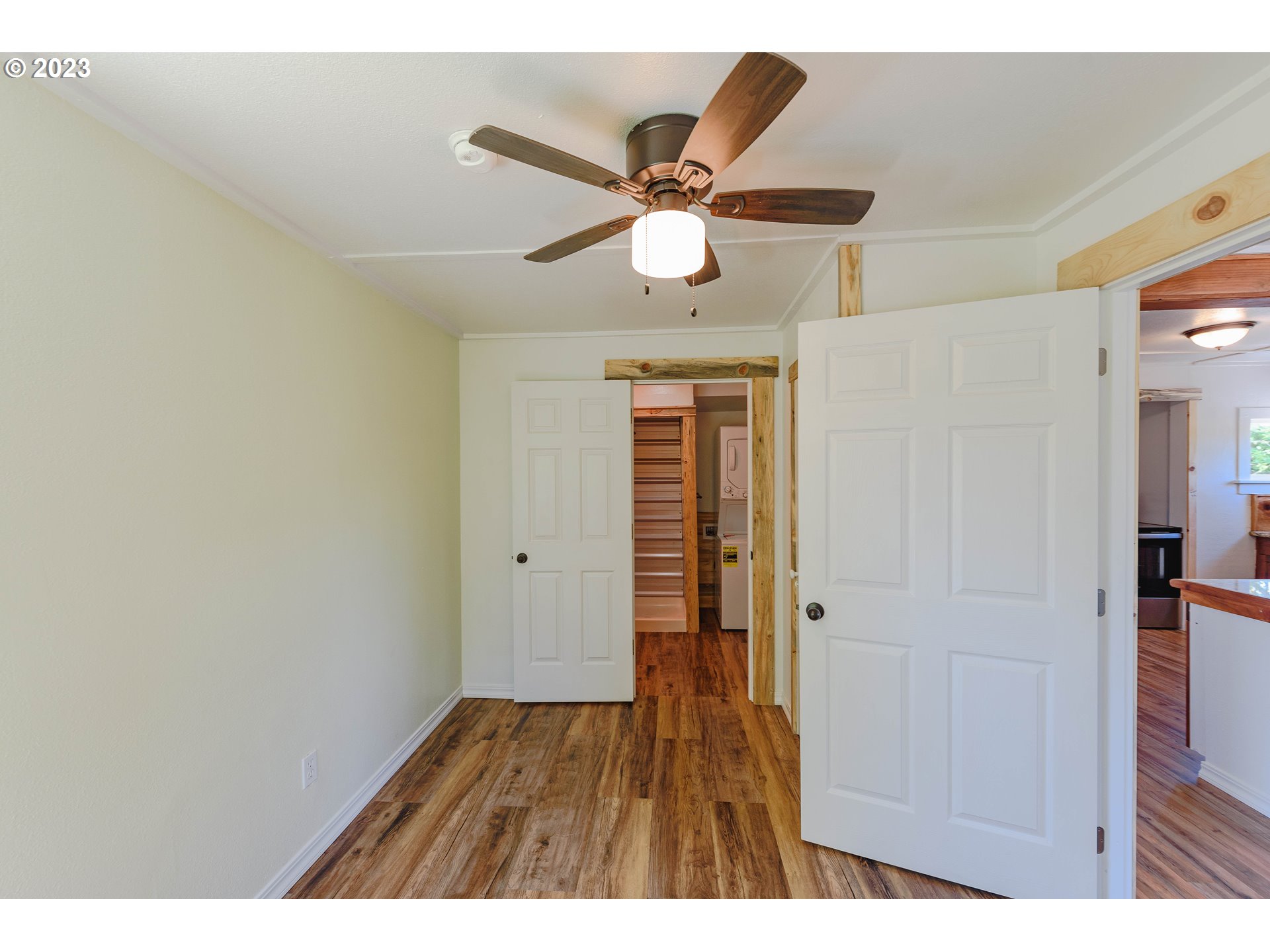 54156 Old Broadbent Road Myrtle Point, OR 97458 - Photo 15 of 48 a view of empty room with wooden floor