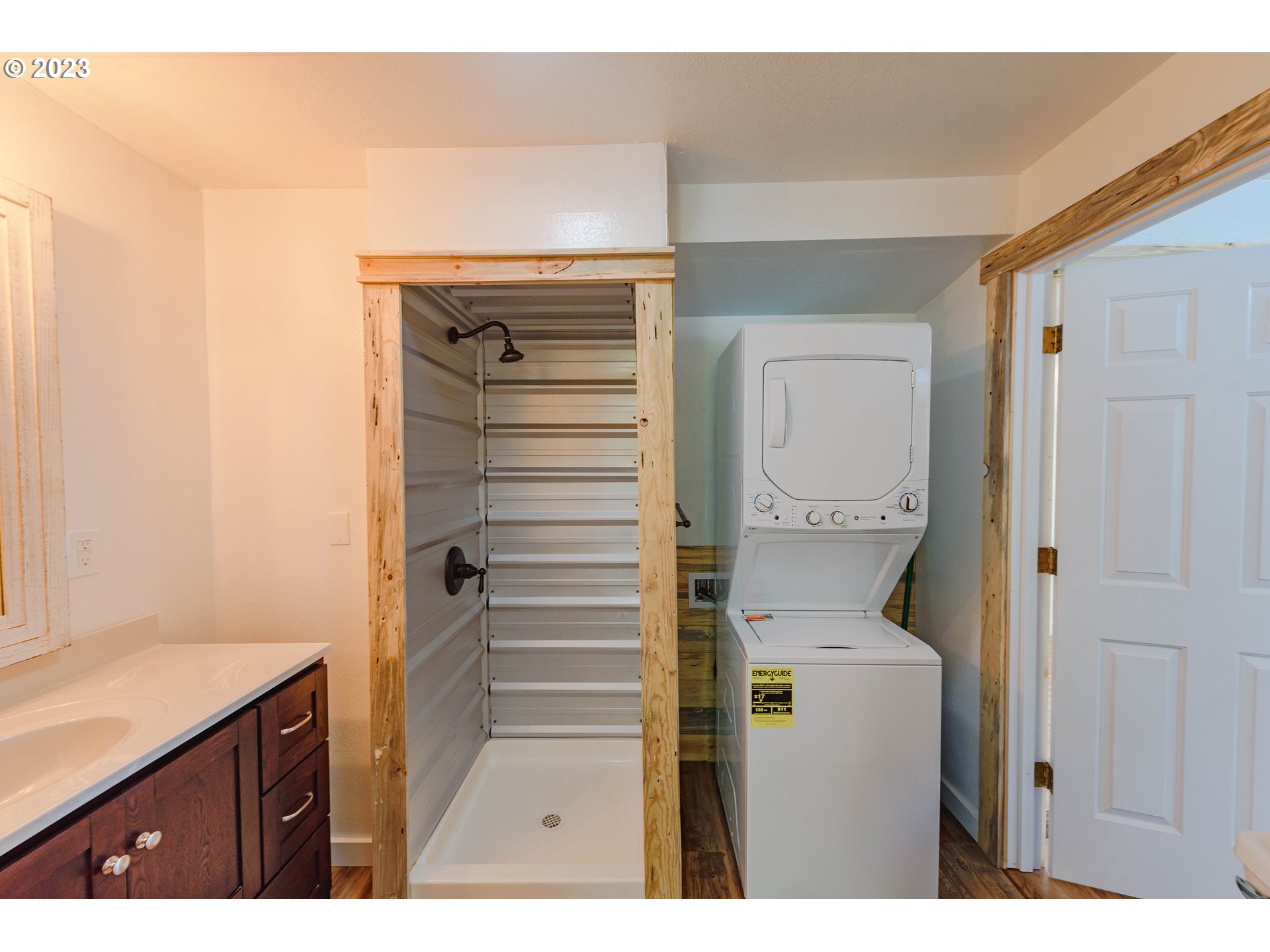 54156 Old Broadbent Road Myrtle Point, OR 97458 - Photo 18 of 48 a bathroom with a sink a toilet and shower