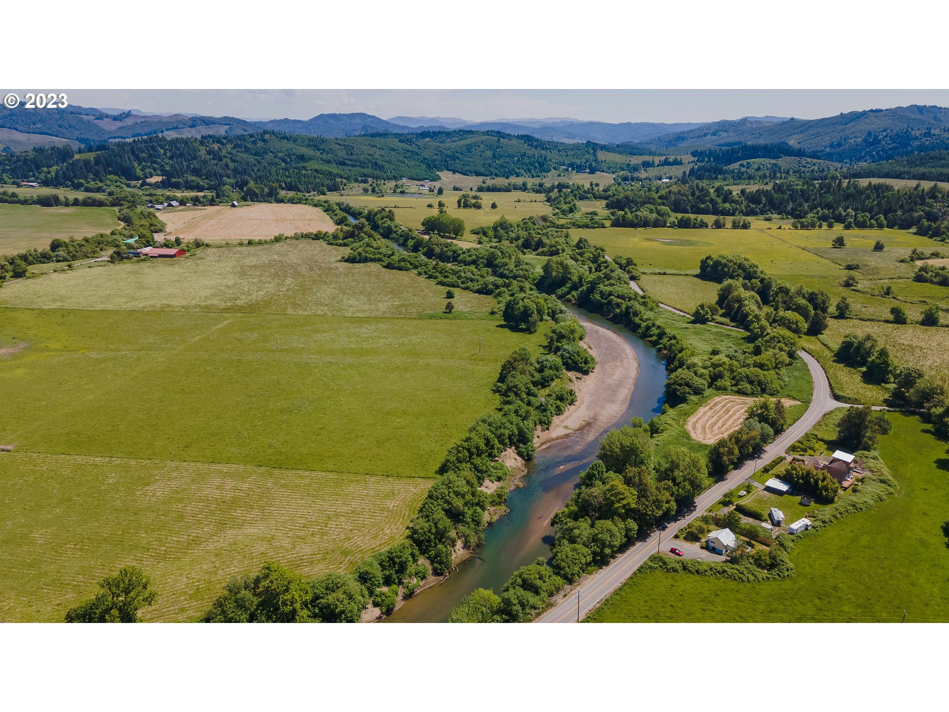 54156 Old Broadbent Road Myrtle Point, OR 97458 - Photo 2 of 48 a view of lake and mountain