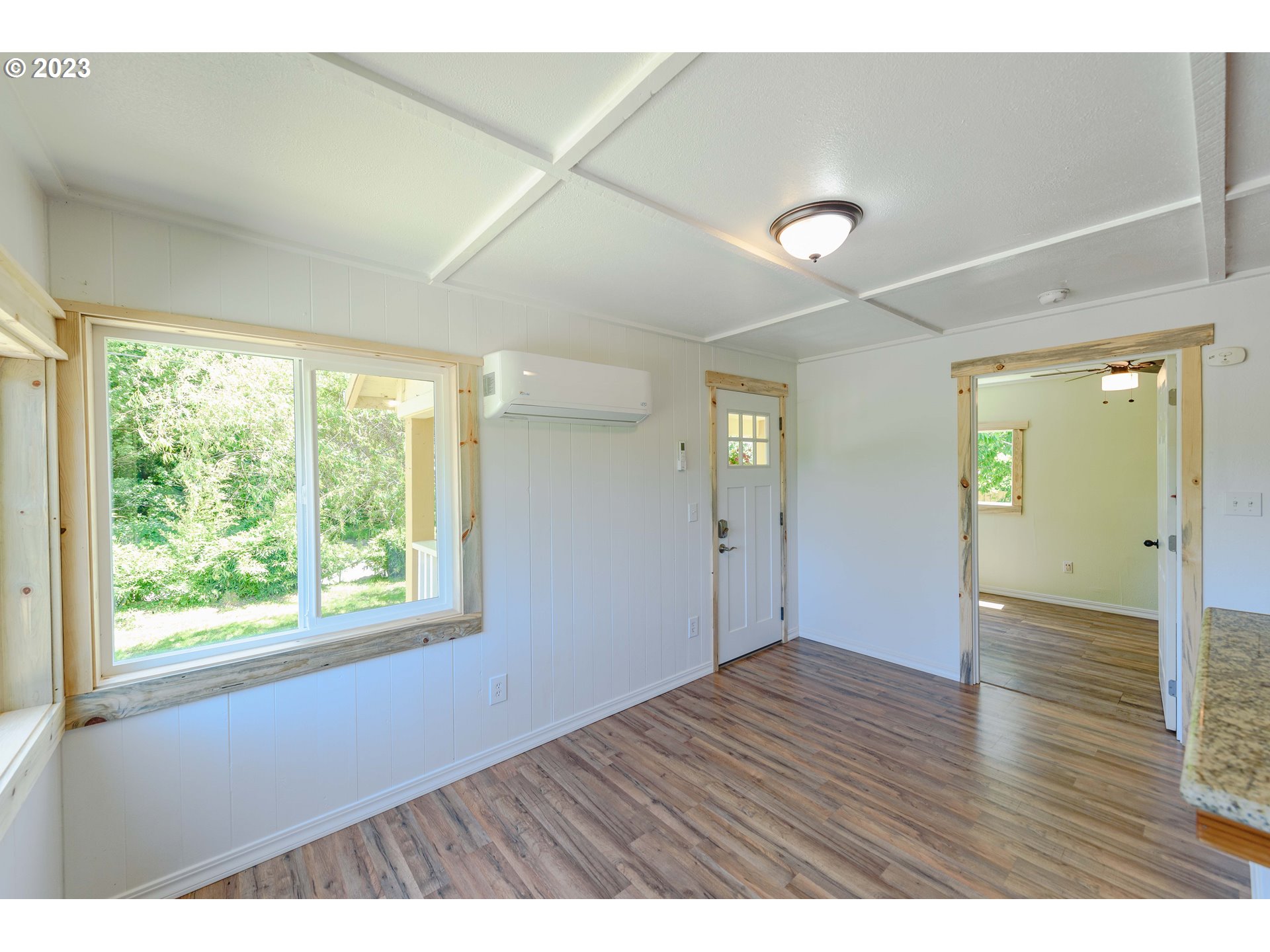 54156 Old Broadbent Road Myrtle Point, OR 97458 - Photo 26 of 48 a view interior of a house wooden floor and windows