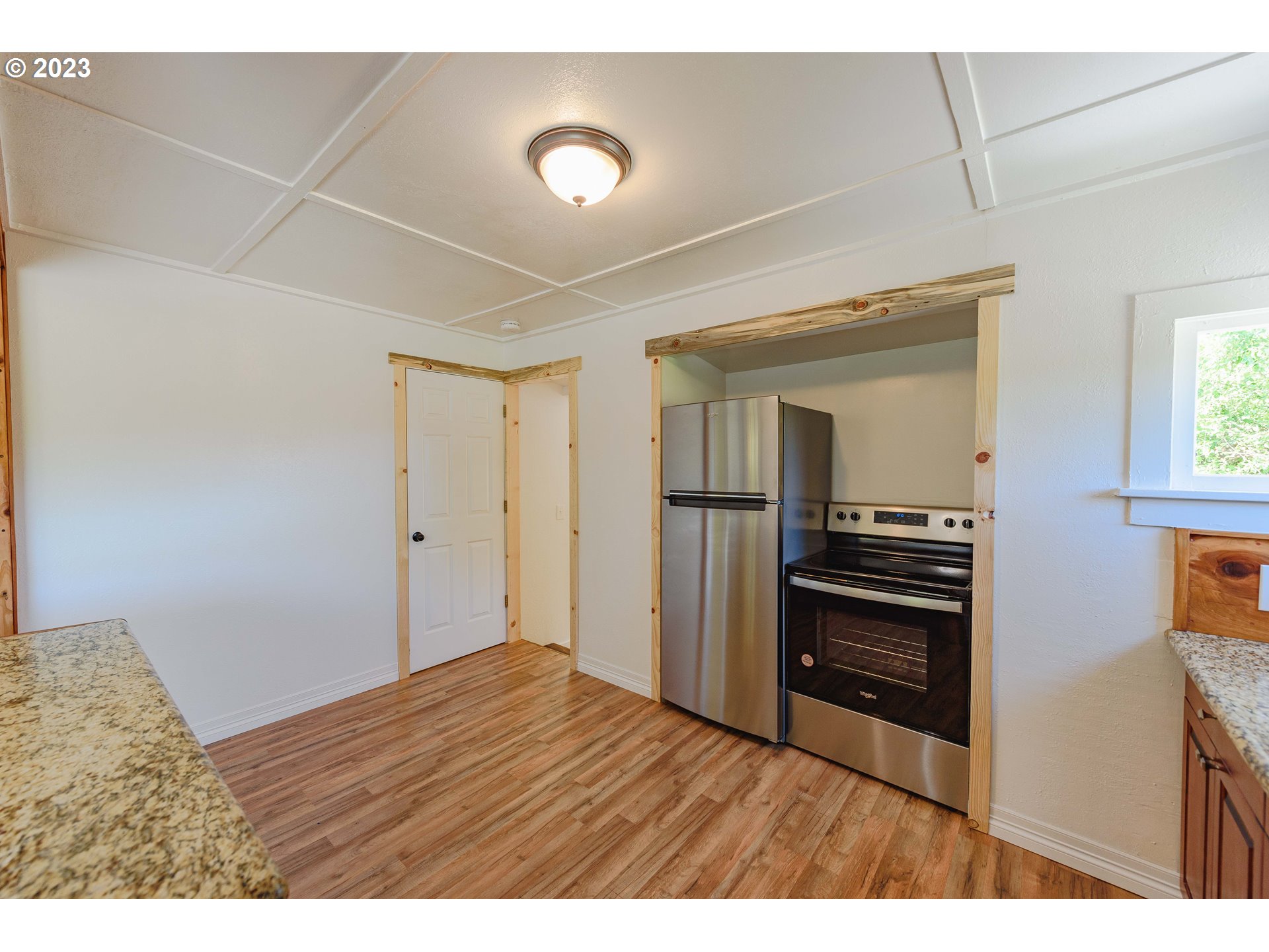 54156 Old Broadbent Road Myrtle Point, OR 97458 - Photo 27 of 48 a view of kitchen with wooden floor