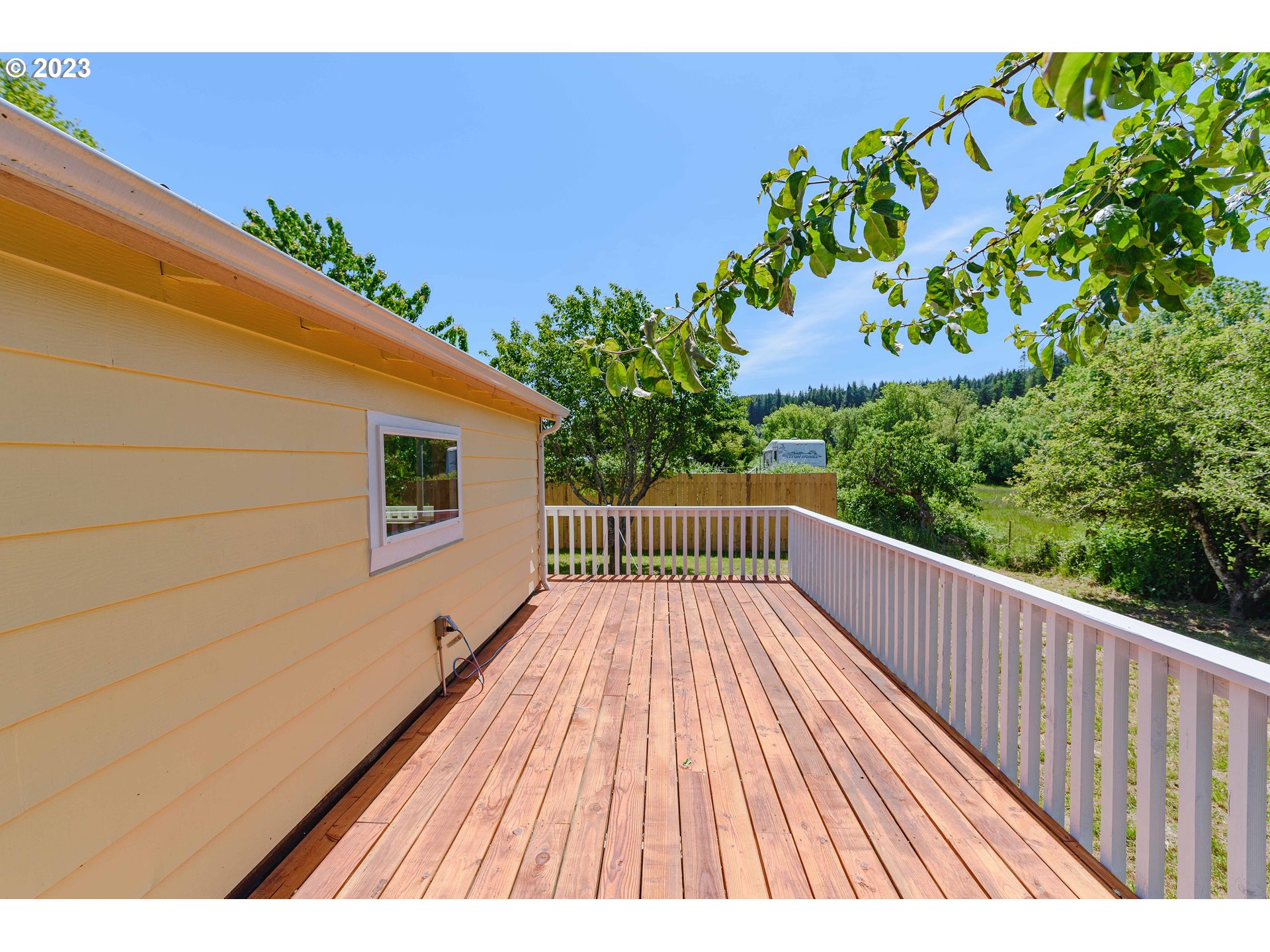 54156 Old Broadbent Road Myrtle Point, OR 97458 - Photo 34 of 48 a view of balcony with wooden floor