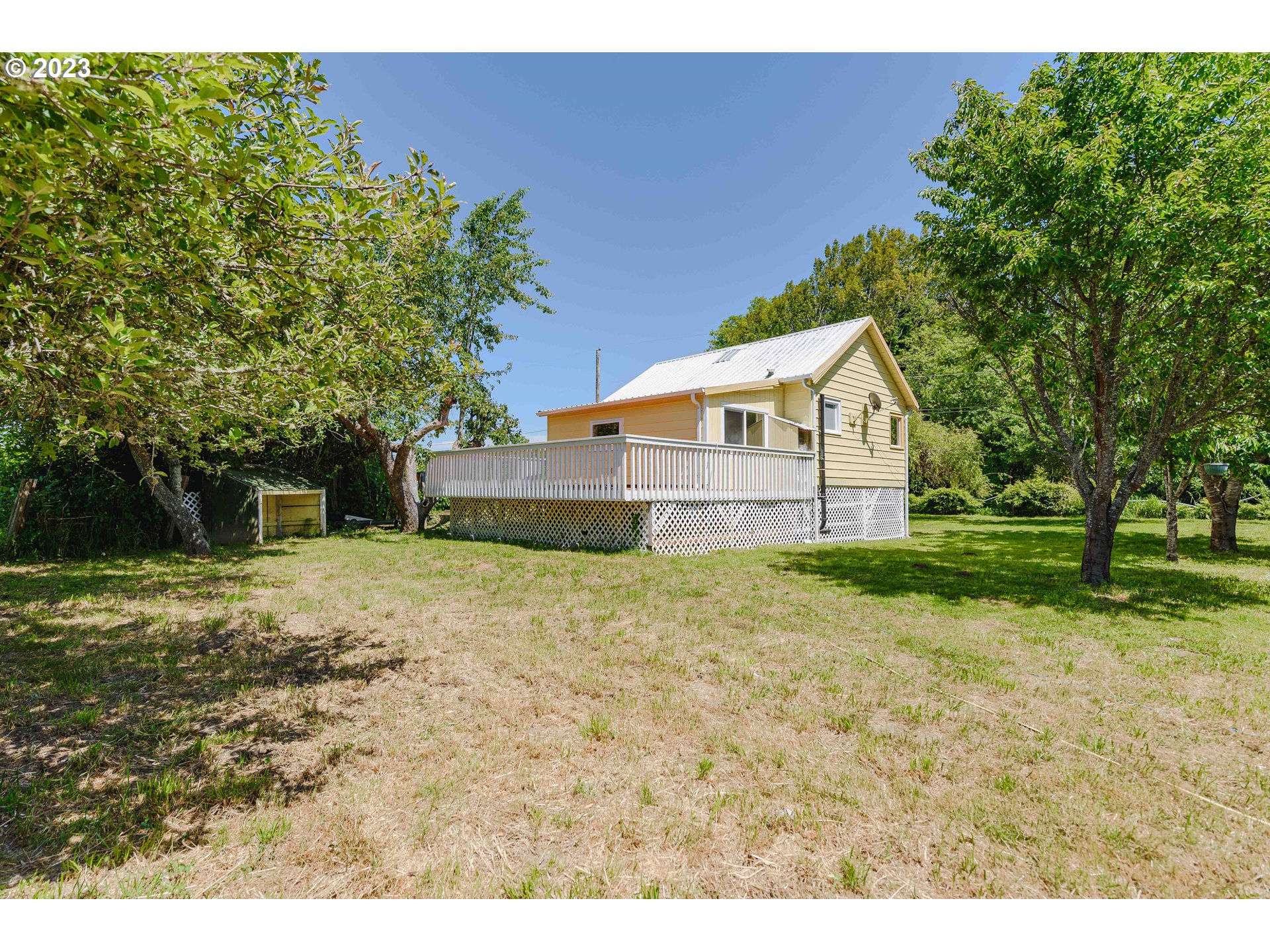 54156 Old Broadbent Road Myrtle Point, OR 97458 - Photo 41 of 48 a view of a house with a yard