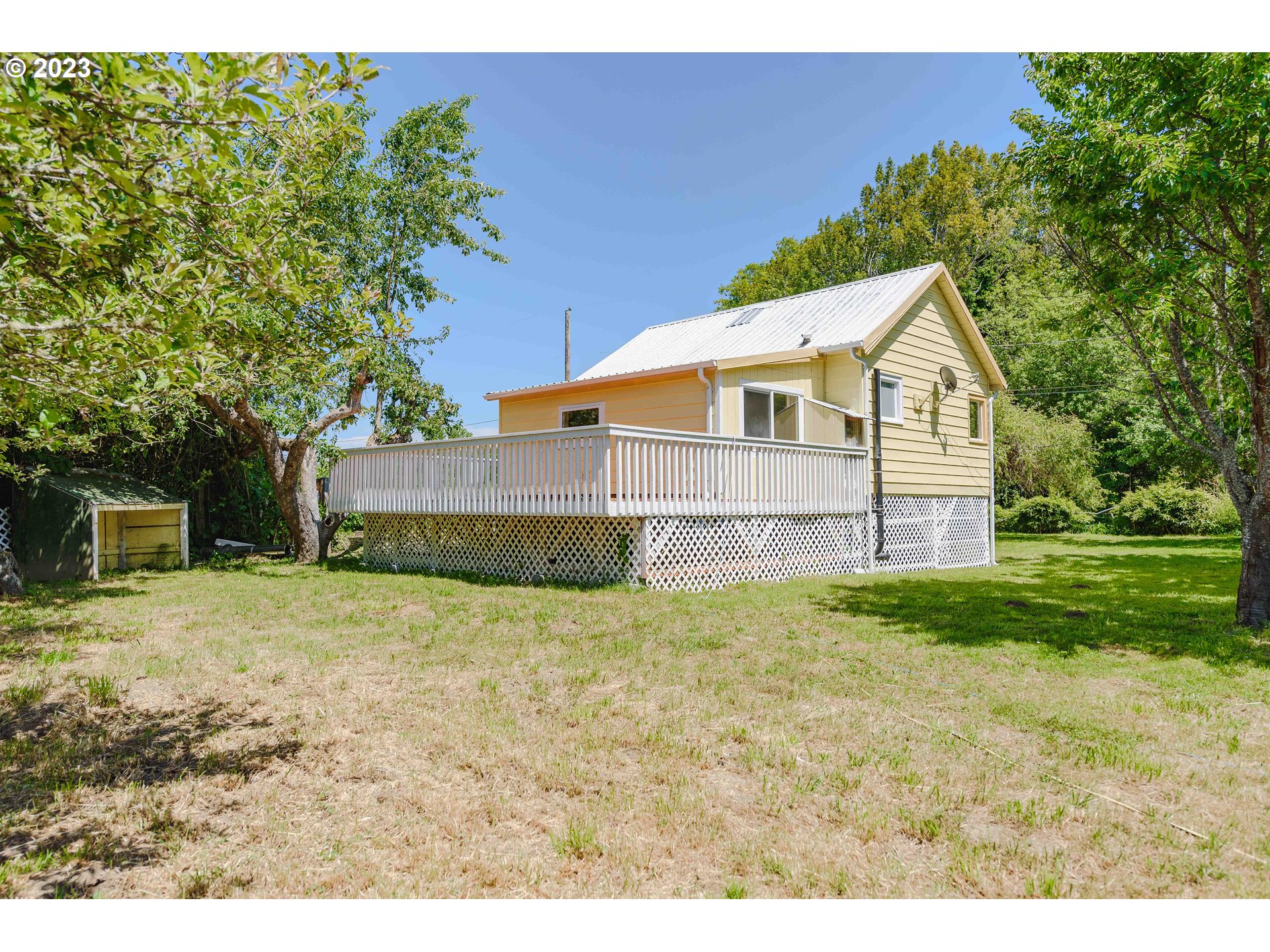 54156 Old Broadbent Road Myrtle Point, OR 97458 - Photo 42 of 48 a view of a house with a backyard