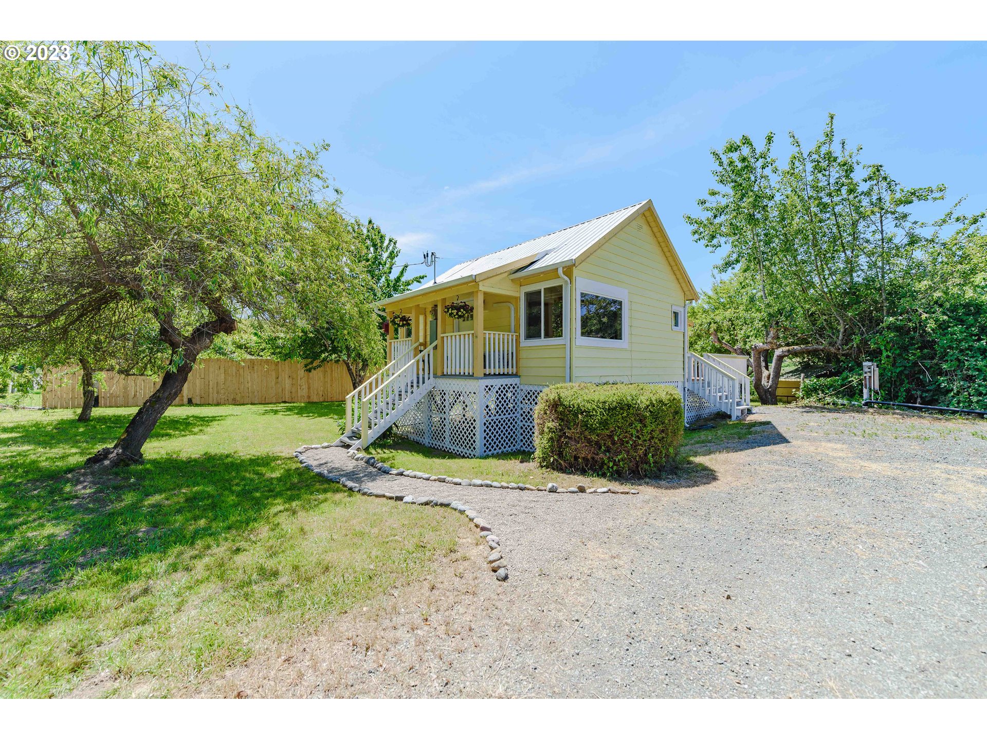 54156 Old Broadbent Road Myrtle Point, OR 97458 - Photo 48 of 48 a front view of a house with a yard