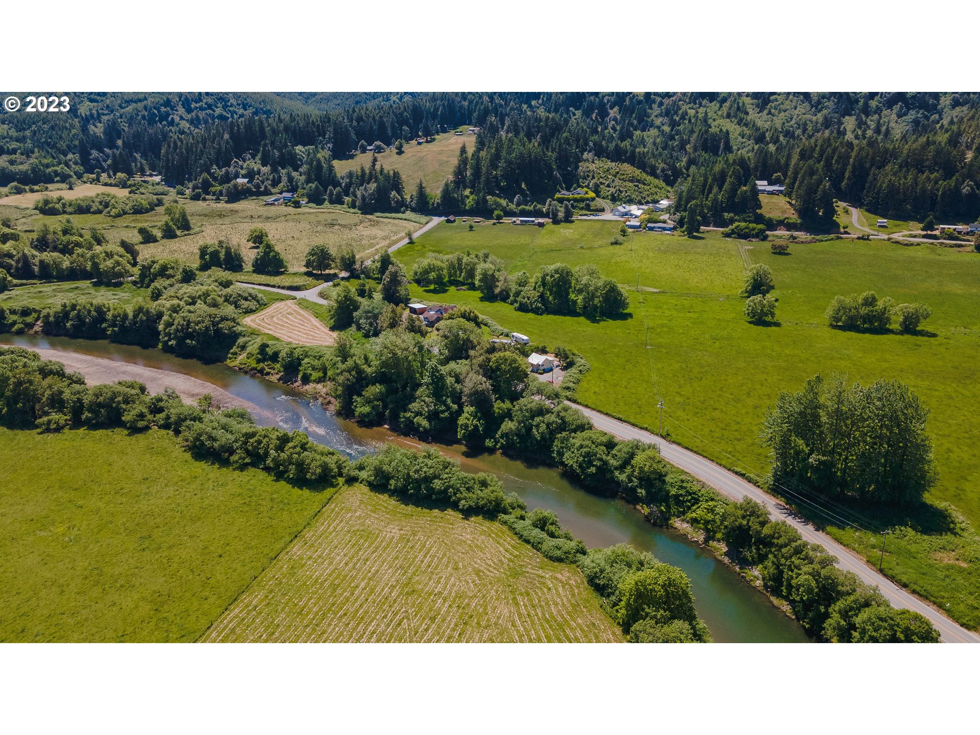 54156 Old Broadbent Road Myrtle Point, OR 97458 - Photo 5 of 48 a picture of houses with outdoor space