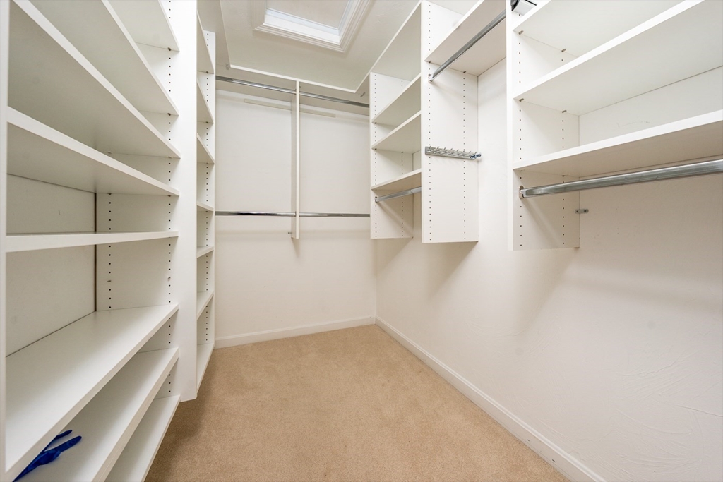15 Beacon Court, Unit 229 Mashpee, MA 02649 - Photo 11 of 33 a view of walk in closet with empty racks