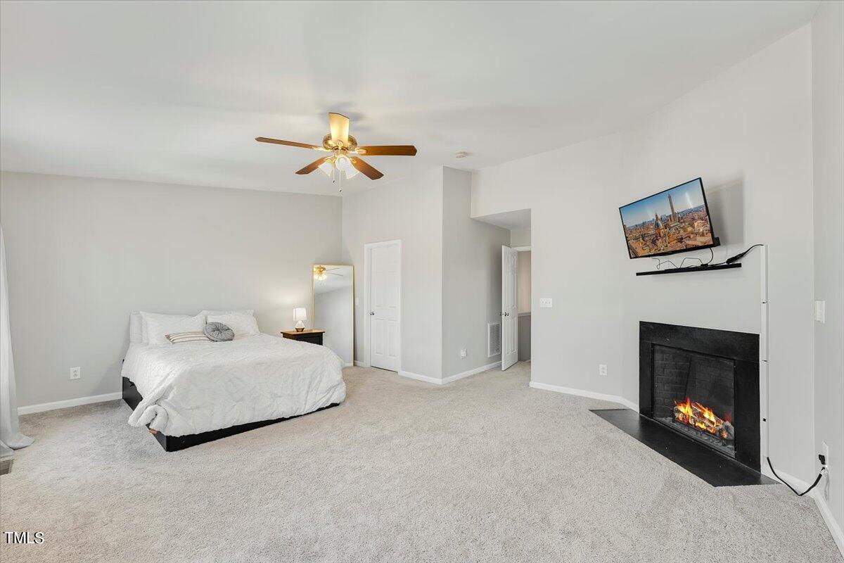 401 Scripps Lane, Unit 102 Raleigh, NC 27610 - Photo 22 of 27 Fireplace is on virtually