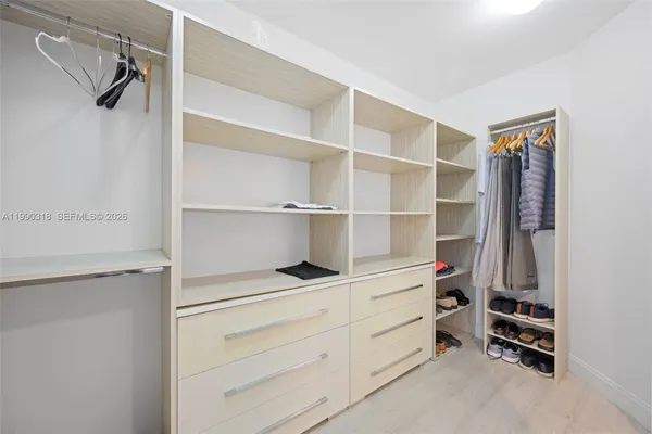 a room with storage and utility room