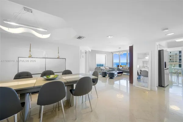 a view of a dining room with furniture
