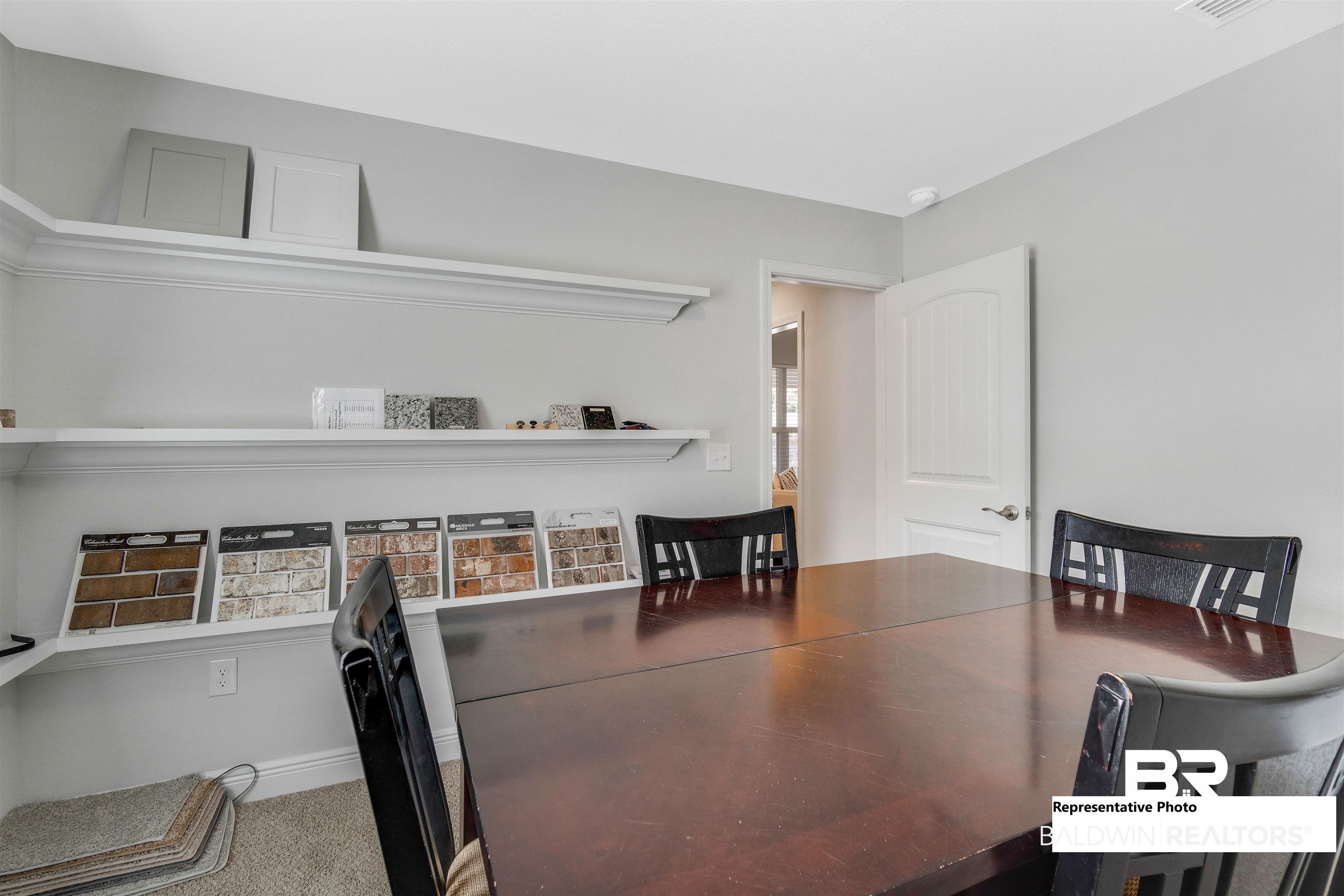 643 Mayflower Drive Foley, AL 36535 - Photo 7 of 34 Dining area featuring carpet floors