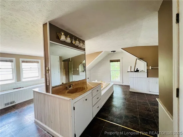 a view of a door and a window