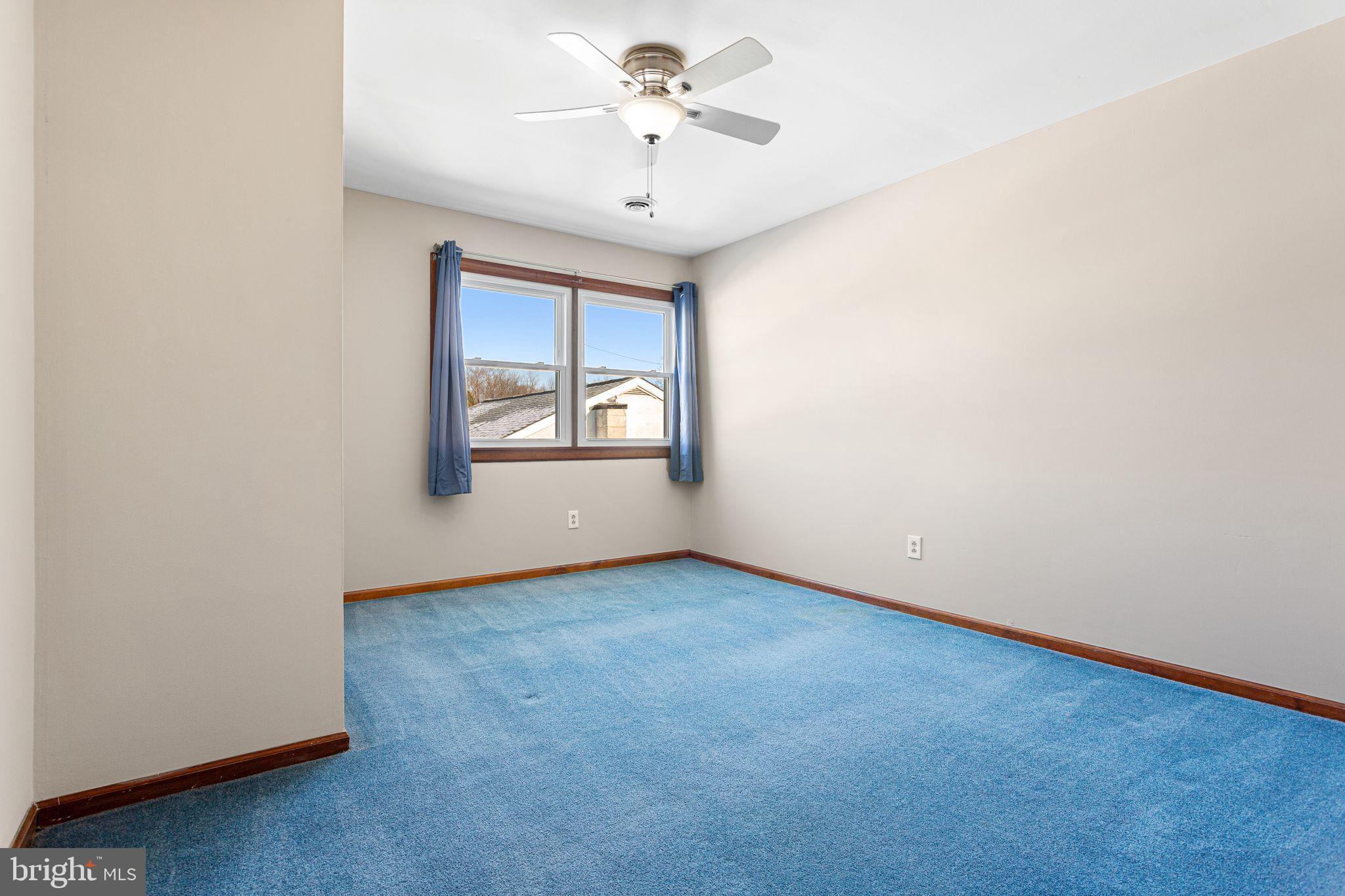 2623 Knights Road Bensalem, PA 19020 - Photo 35 of 50 an empty room with windows and fan