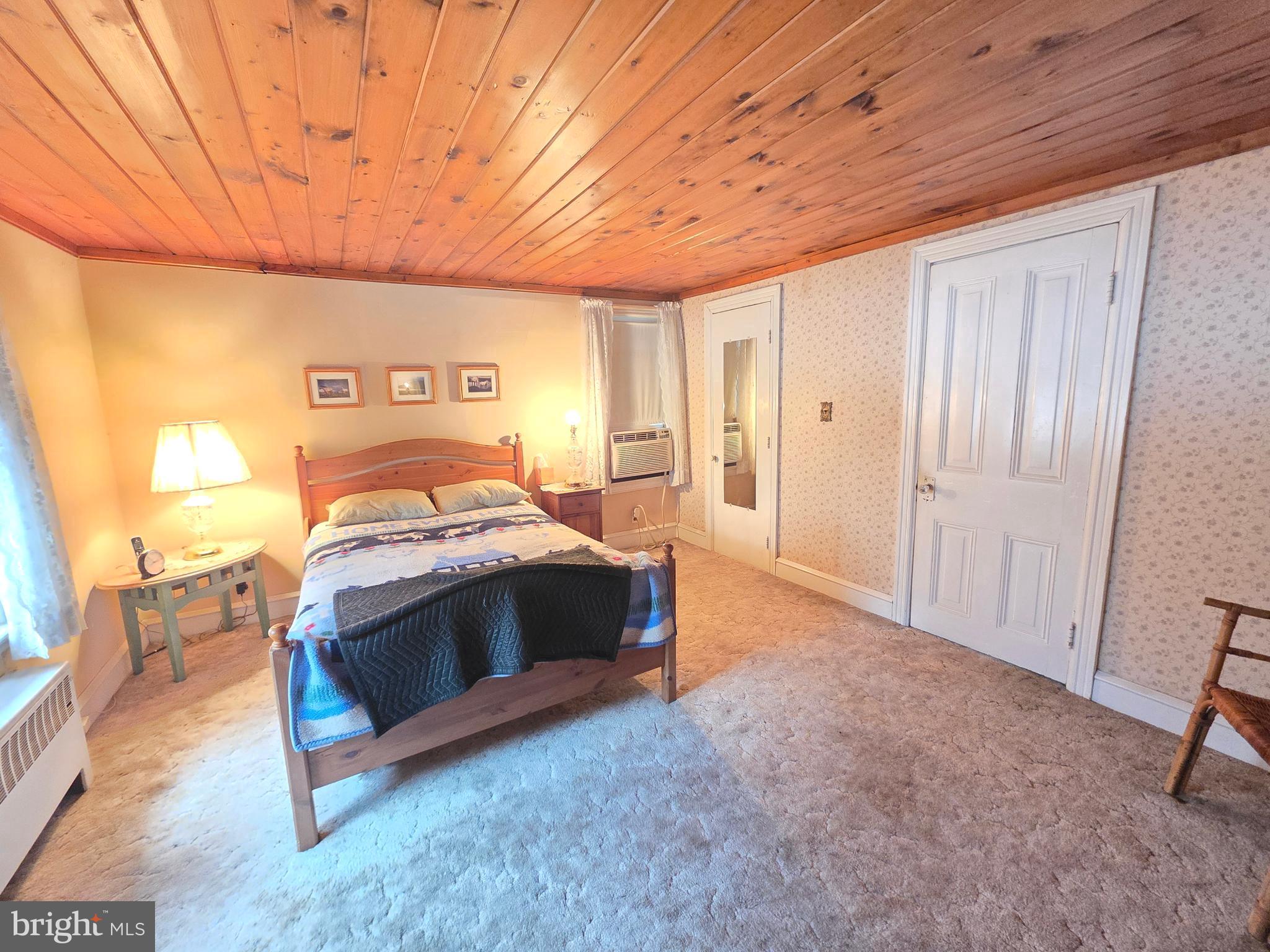 3016 County House Road Woodbury, NJ 08096 - Photo 13 of 19 a bedroom with a bed and a table