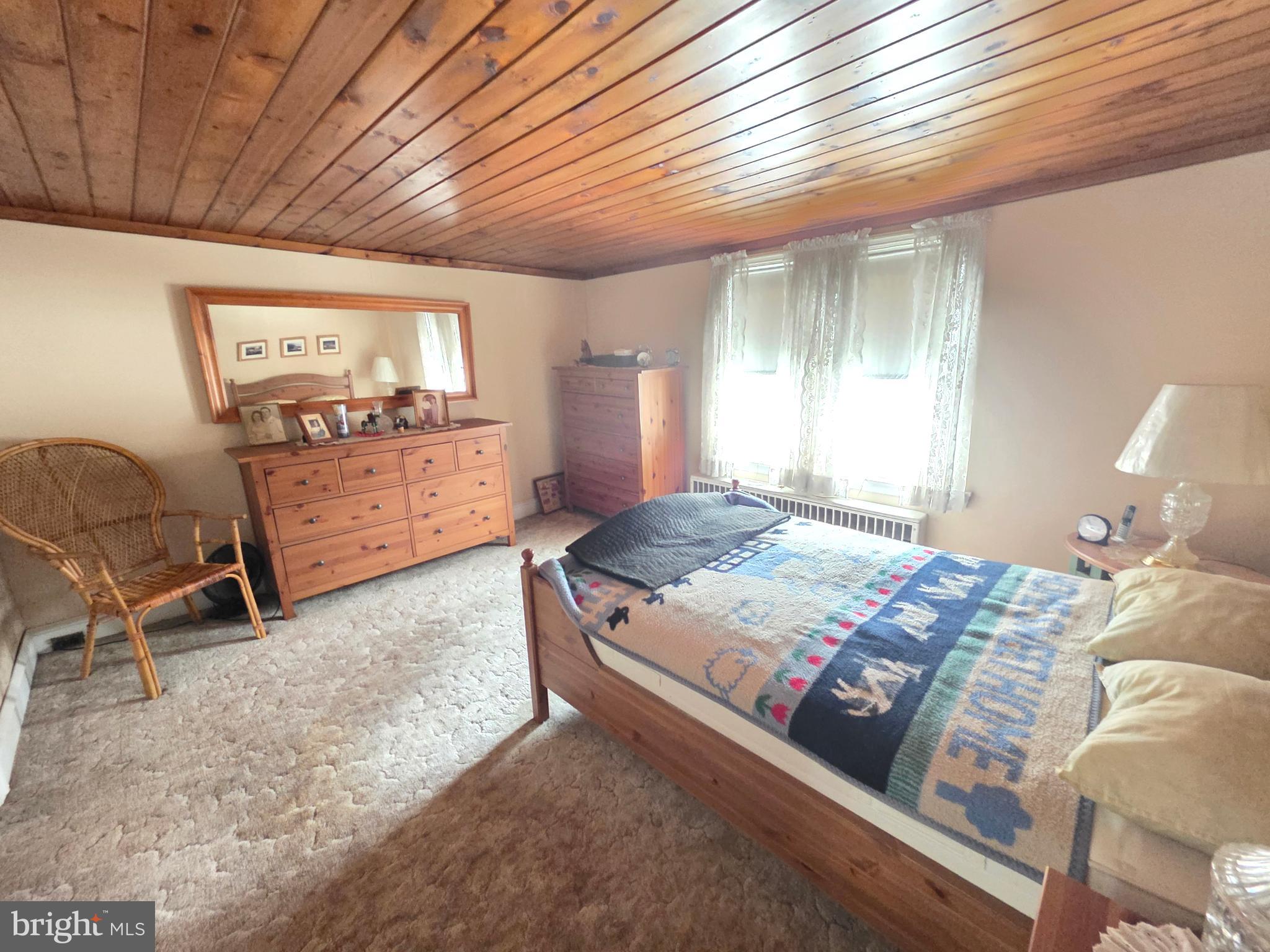 3016 County House Road Woodbury, NJ 08096 - Photo 14 of 19 a bedroom with a bed and window