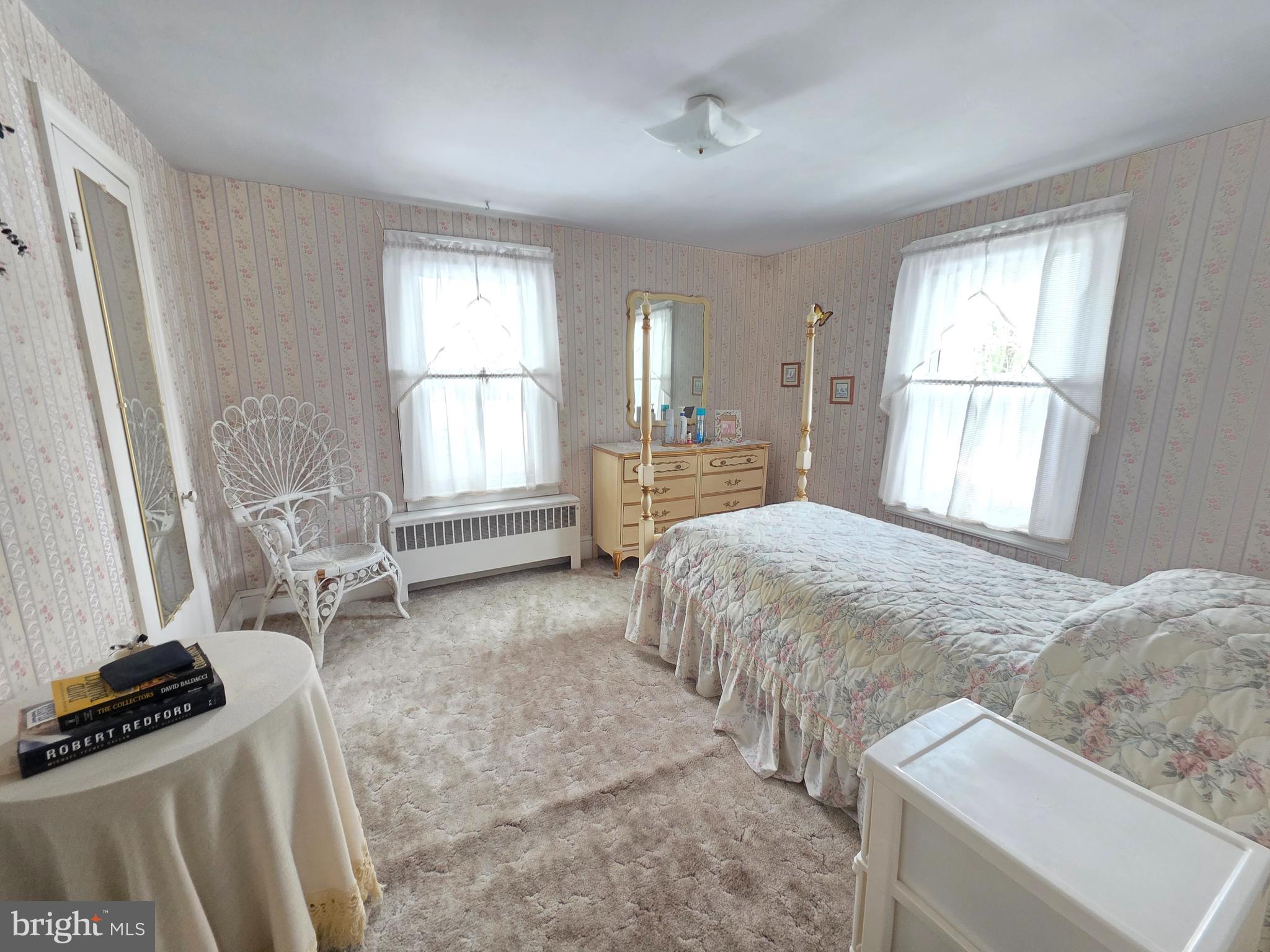 3016 County House Road Woodbury, NJ 08096 - Photo 15 of 19 a bedroom with a bed and a window