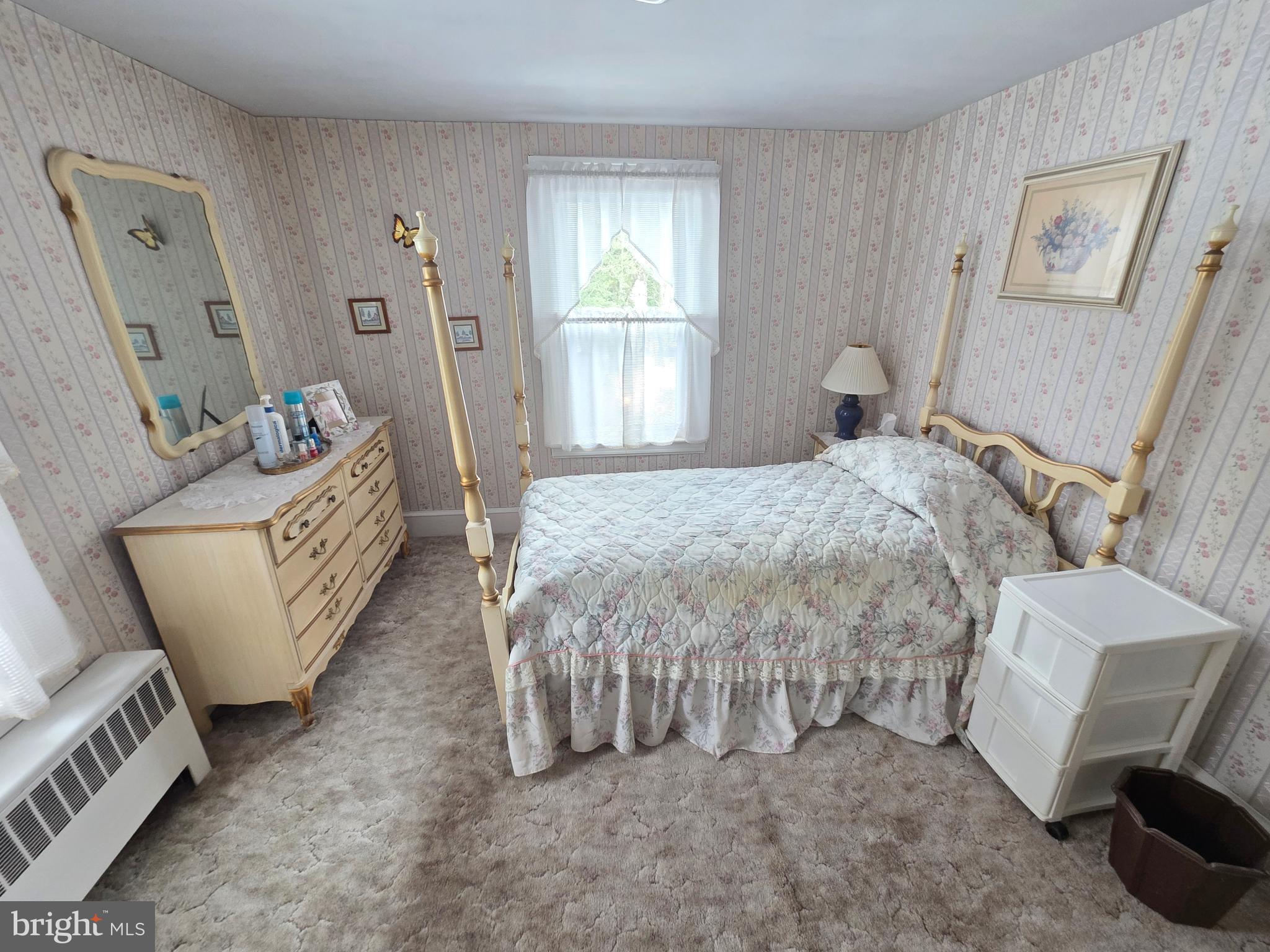 3016 County House Road Woodbury, NJ 08096 - Photo 16 of 19 a bed room with a bed and a chair
