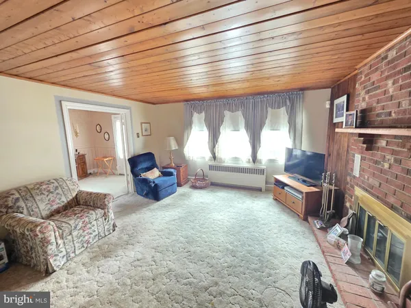 a room with furniture and a fireplace