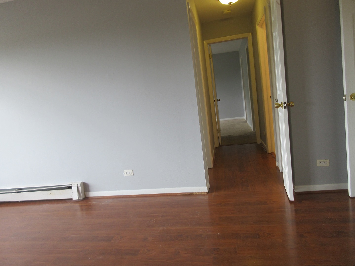 7255 North Ridge Boulevard, Unit 403 Chicago, IL 60645 - Photo 20 of 30 wooden floor in an empty room