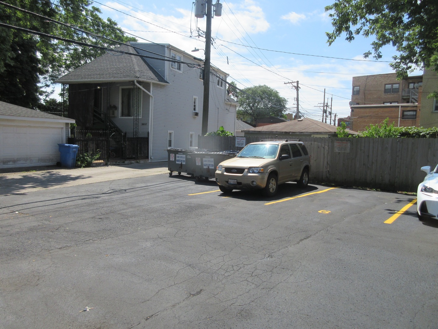7255 North Ridge Boulevard, Unit 403 Chicago, IL 60645 - Photo 30 of 30 a car parked in front of house