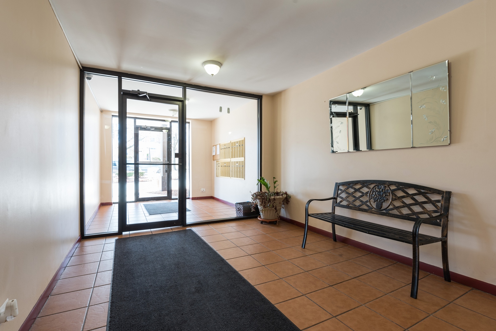 7255 North Ridge Boulevard, Unit 403 Chicago, IL 60645 - Photo 7 of 30 a living room with furniture and a floor to ceiling window